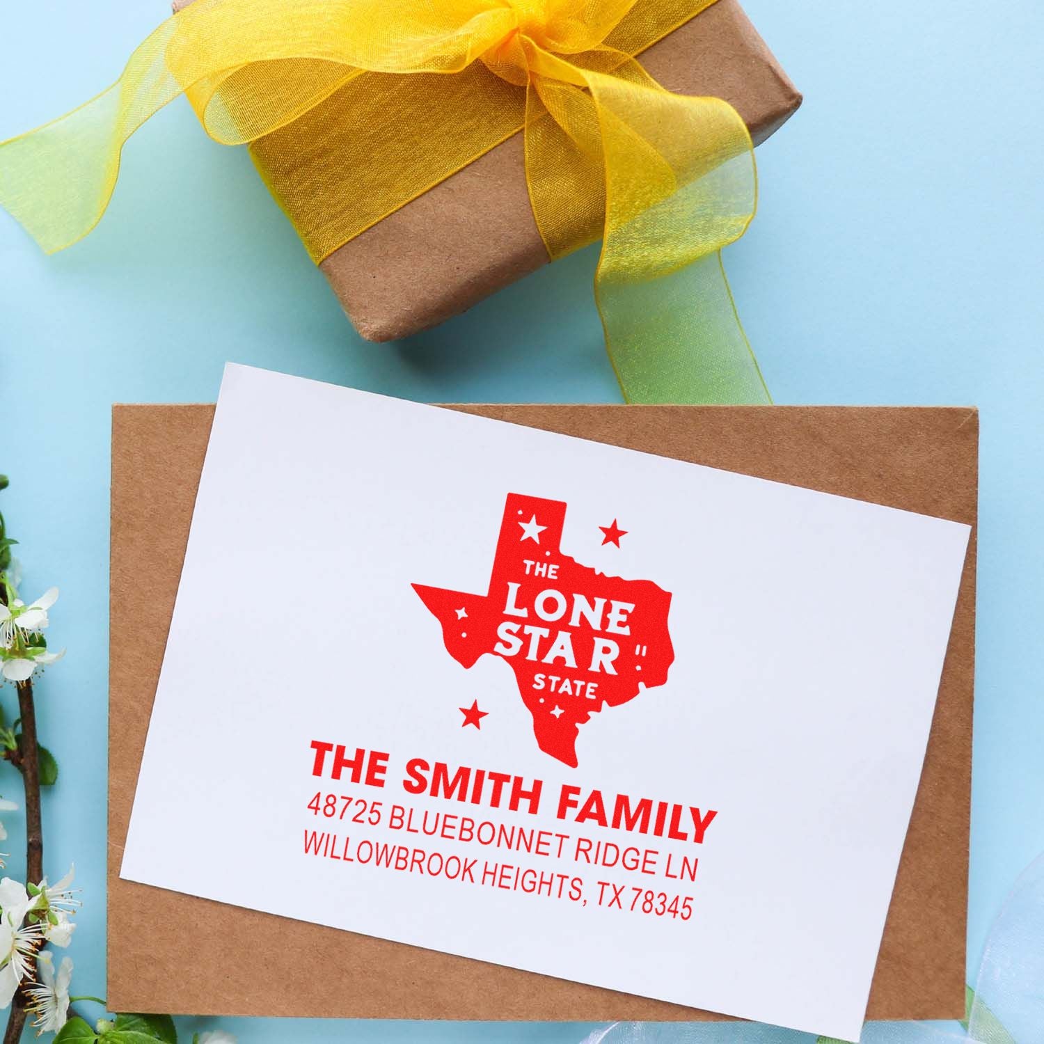Custom Texas return address rubber stamp on envelope with Lone Star State design for personalized holiday mail.