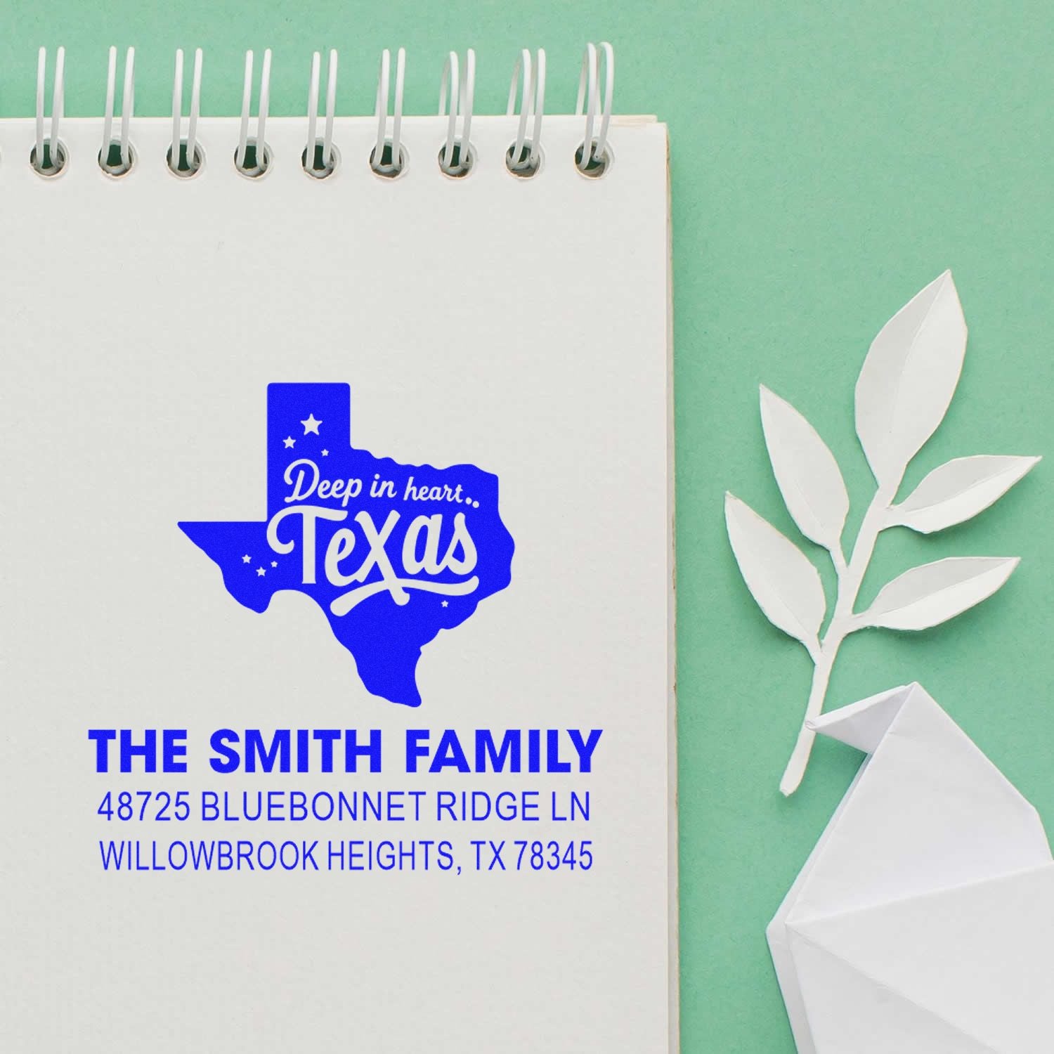 Texas-shaped custom return address rubber stamp for The Smith Family, featuring a blue address design and Willowbrook Heights, TX.