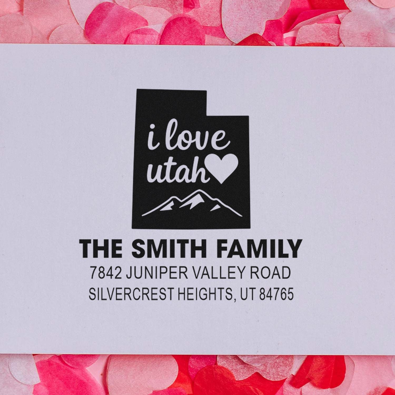 Personalized Utah return address rubber stamp for The Smith Family with mountain logo and home address.