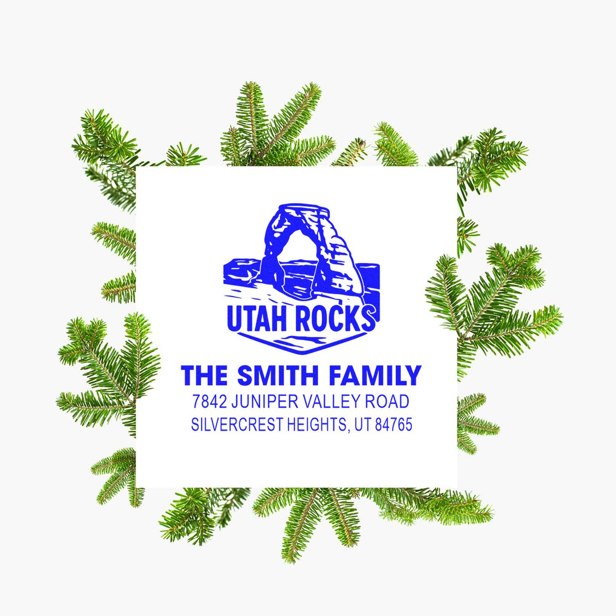 Custom Utah Rocks return address rubber stamp for The Smith Family, with full address and evergreen tree accents.
