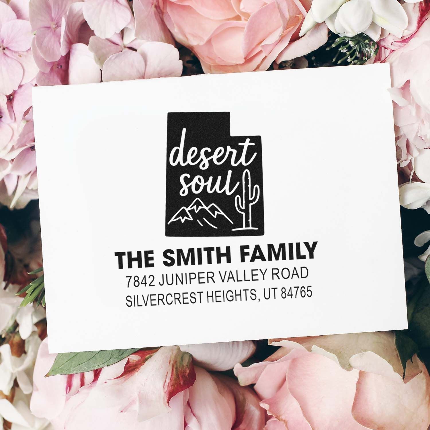 Custom rubber stamp return address design with Arizona desert soul graphic for The Smith Family mailing envelopes.