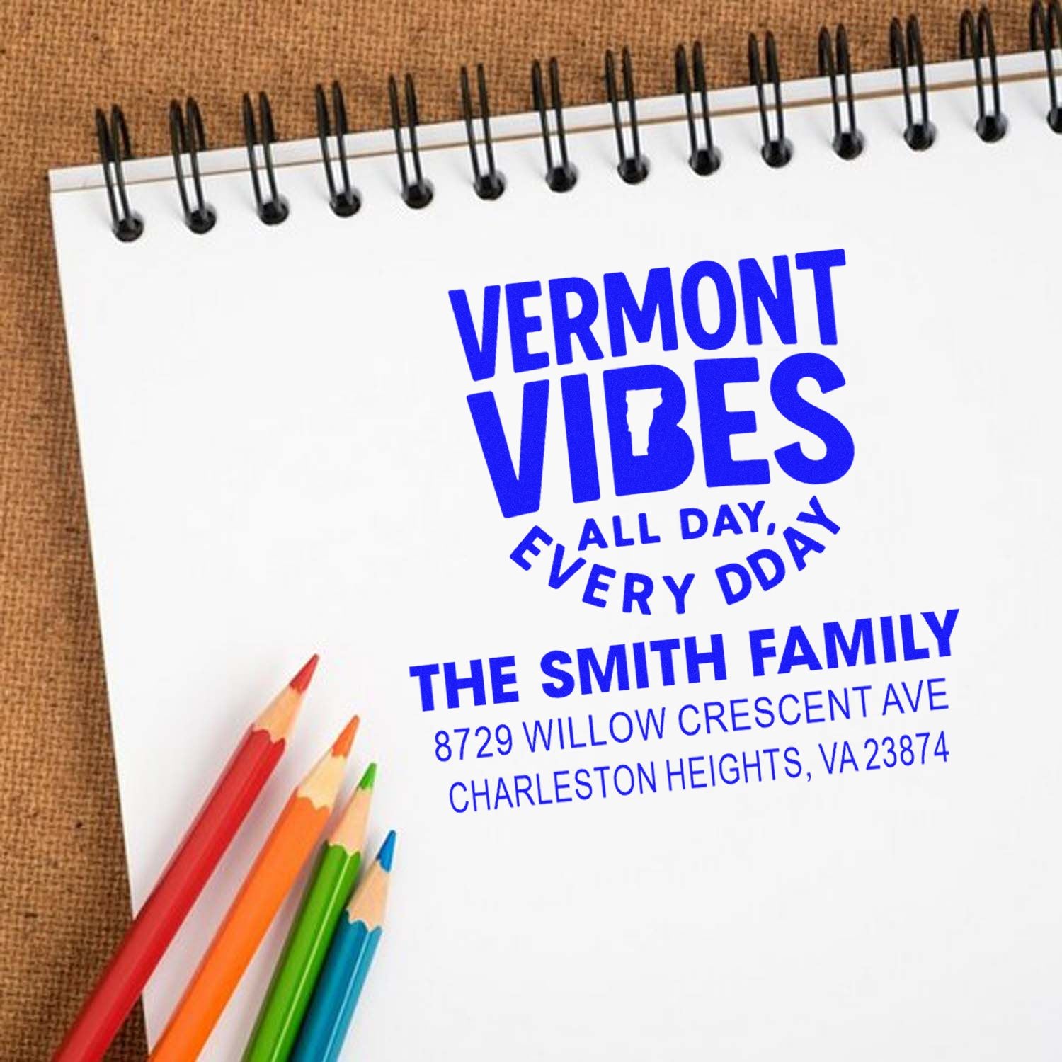 Custom rubber stamp design with Vermont Vibes slogan, Smith family name, and return address for personalized mailing.