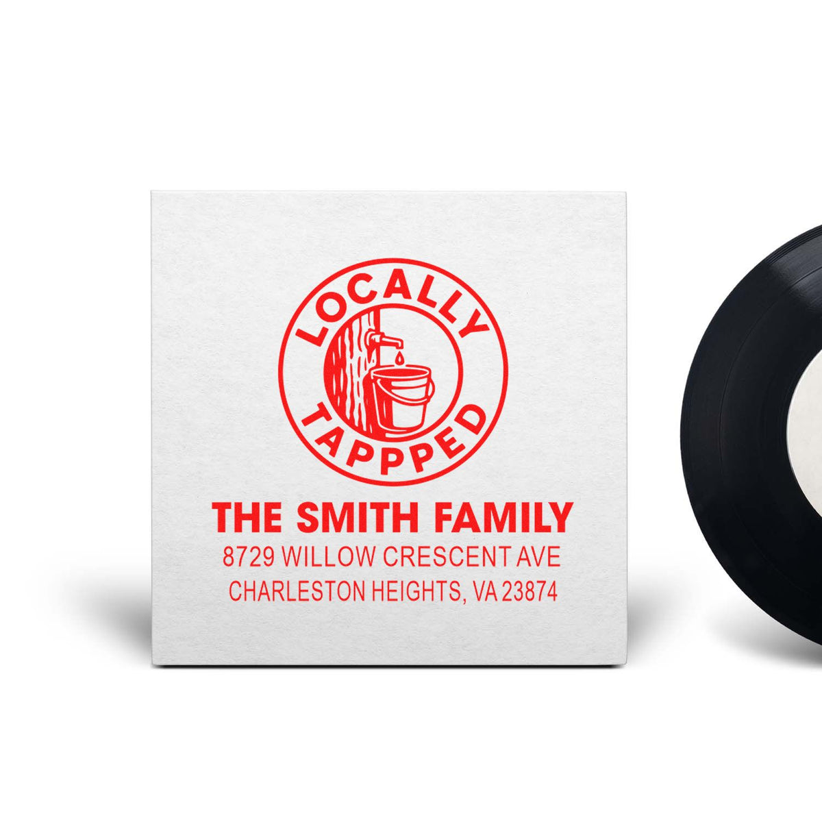 Custom return address rubber stamp with Locally Tapped logo, The Smith Family name, and Charleston Heights, VA address.