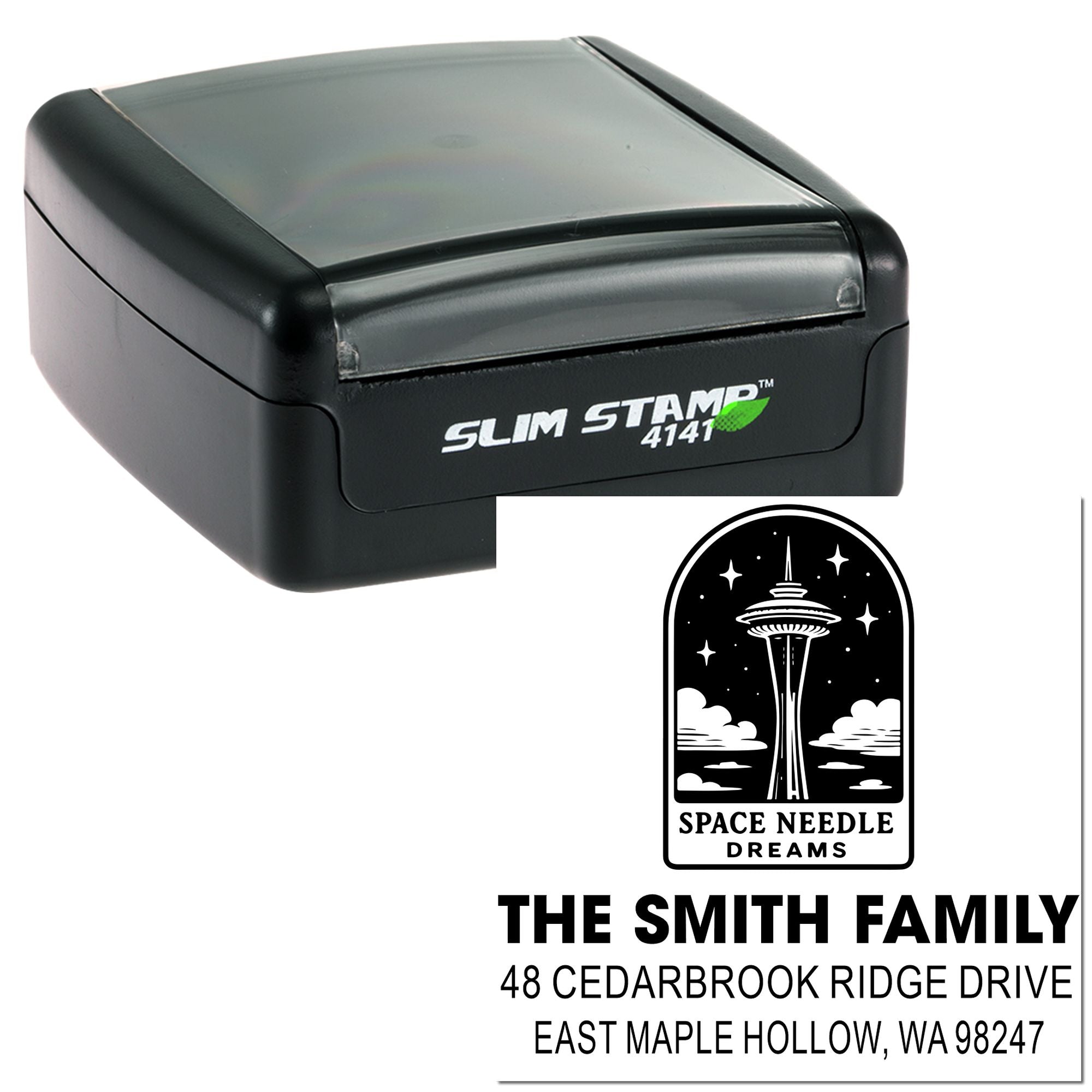 Custom self-inking address stamp with Seattle Space Needle design, showing The Smith Family imprint and East Maple Hollow, WA address on white background.