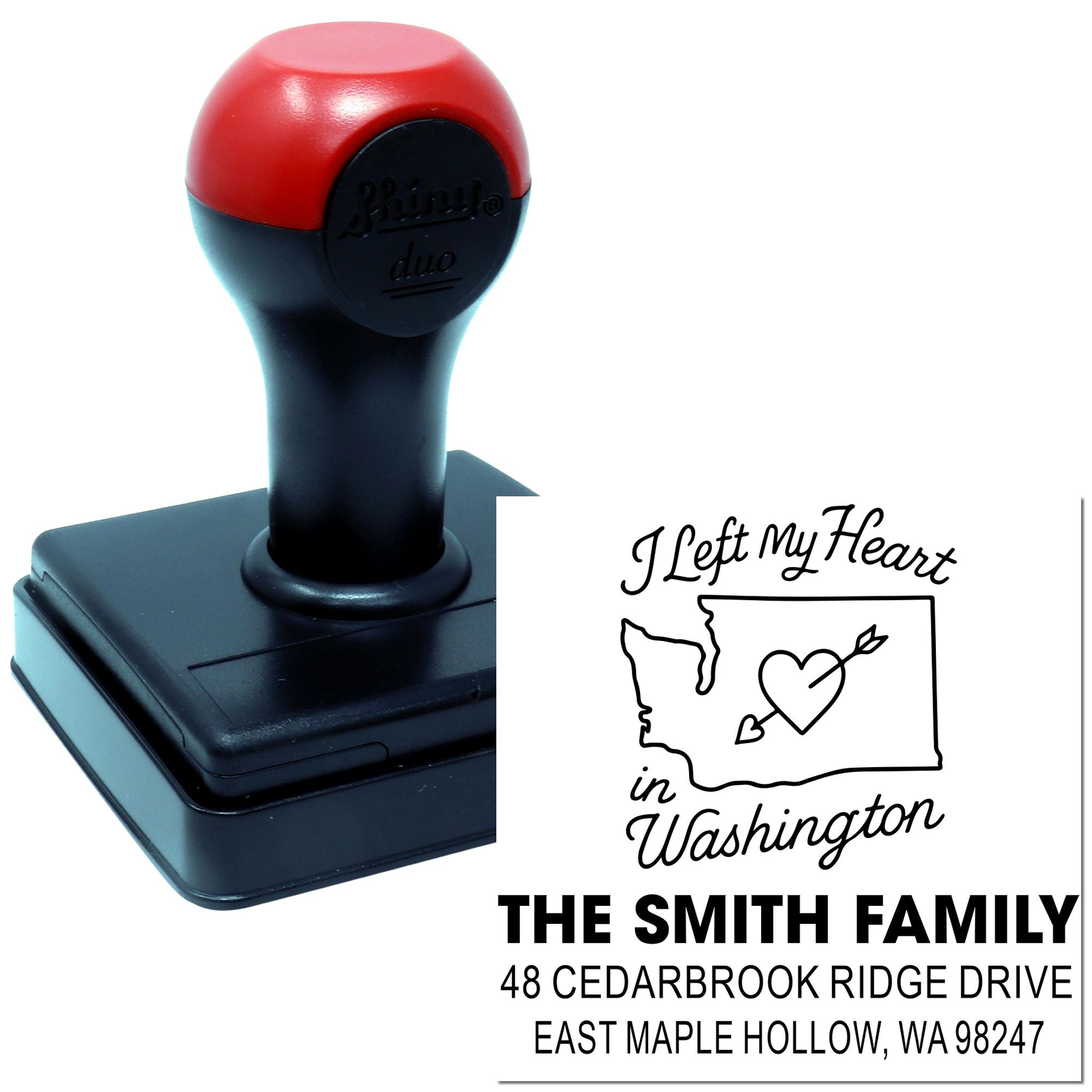 Self-inking custom address stamp on white background with red-and-black handle, showing Washington heart map design and The Smith Family imprint.