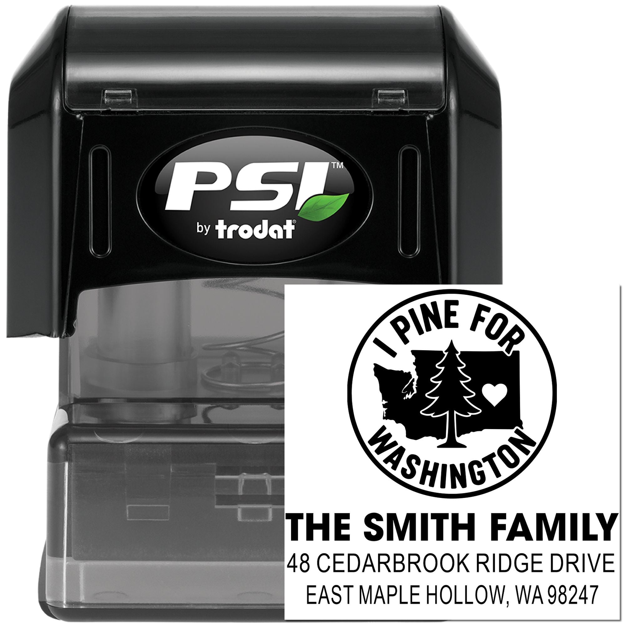 Black PSI by trodat self-inking custom address stamp, with Washington pine tree design and The Smith Family imprint, on white background.