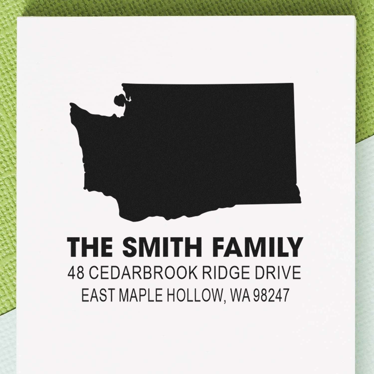 Custom return address stamp with Washington state silhouette for The Smith Family, featuring East Maple Hollow, WA address.