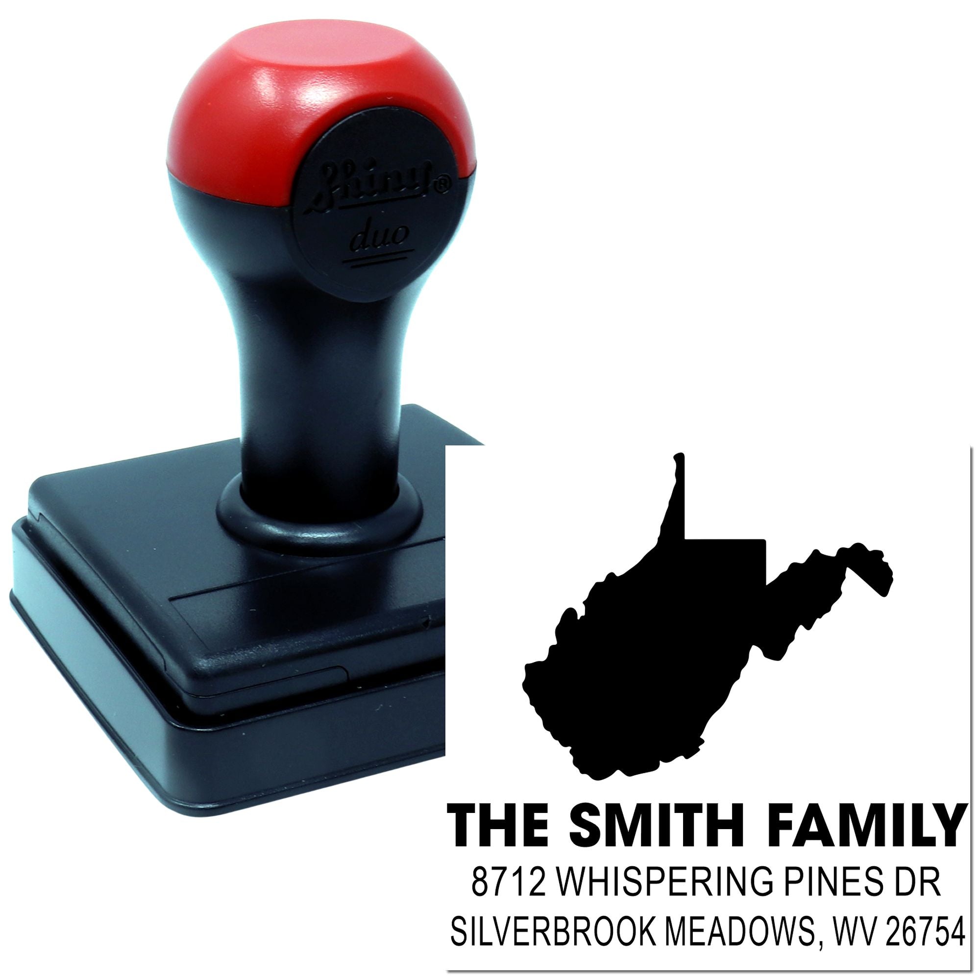 Custom self-inking address stamp with red-and-black handle and proof print for The Smith Family, Silverbrook Meadows, WV, on a white background.