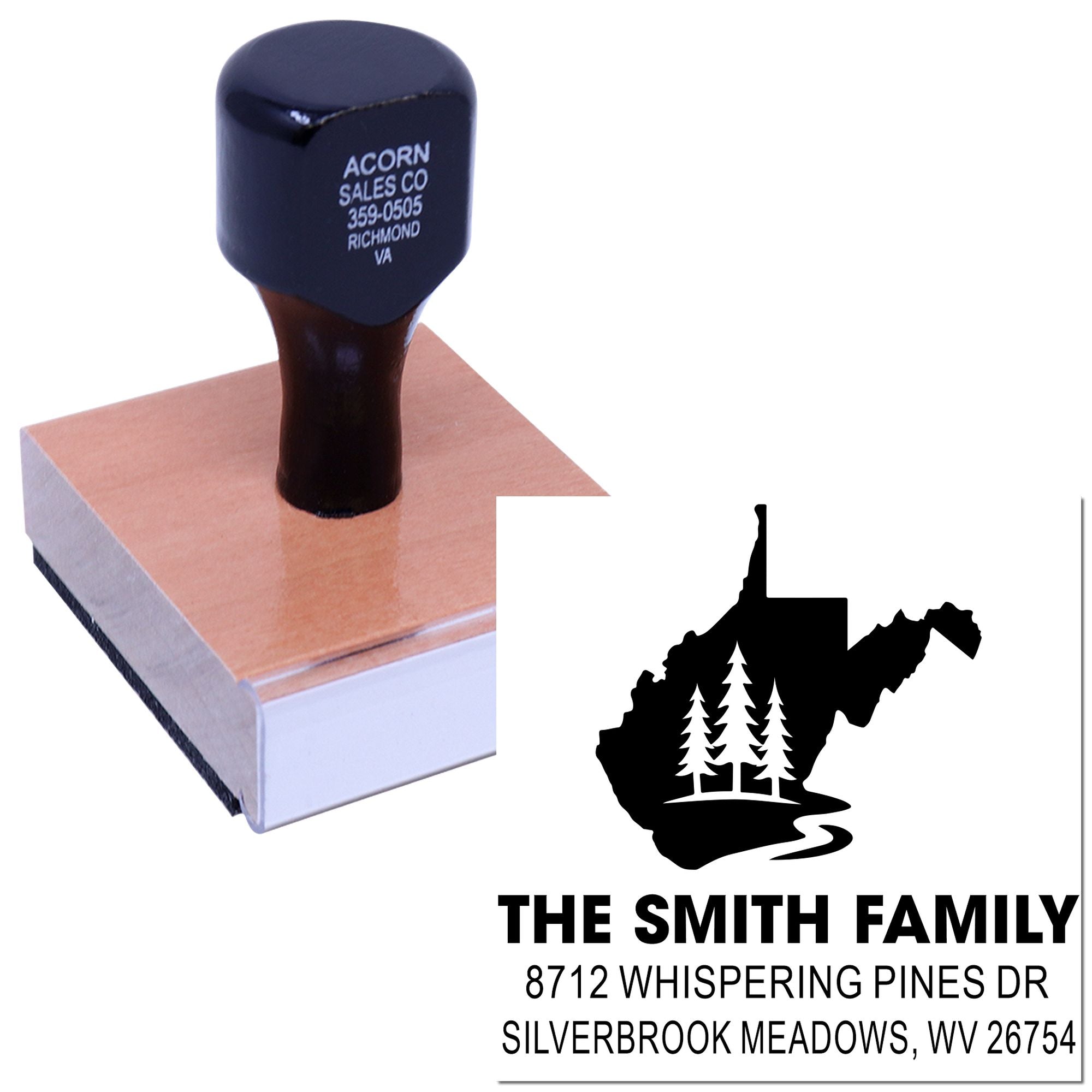 Custom self-inking address stamp with mountain and pine tree design, shown beside the stamp handle on a white background.