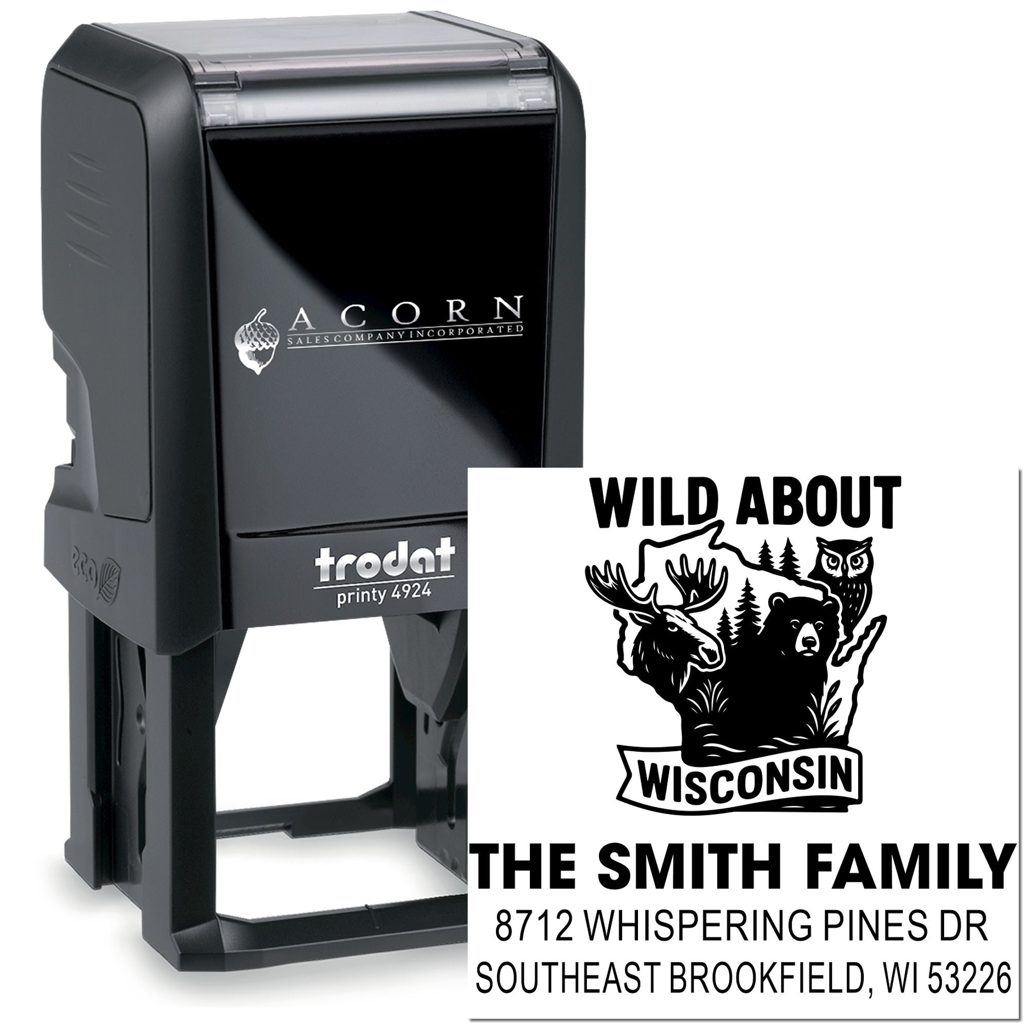 Custom self-inking Trodat stamp with Wisconsin wildlife family address design, featuring moose, bear and owl on a white background.
