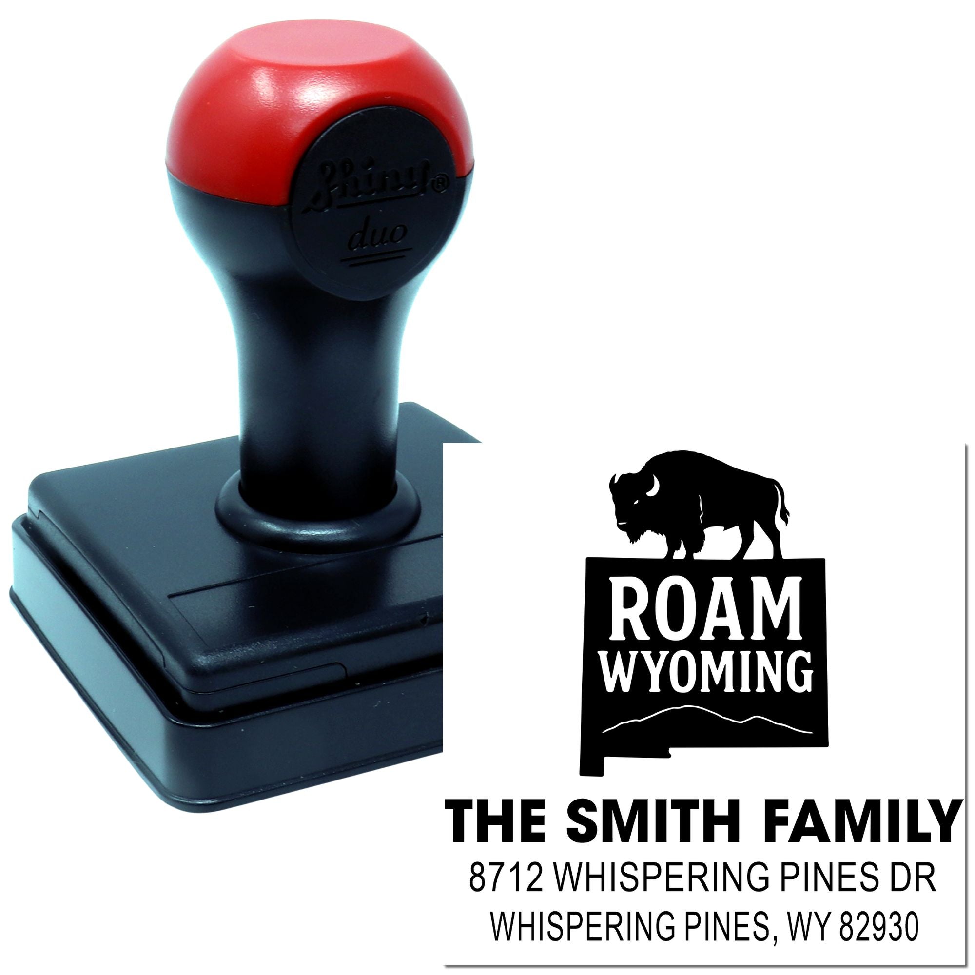 Custom self-inking address stamp with Wyoming bison design, featuring The Smith Family and Whispering Pines, WY on a white background.