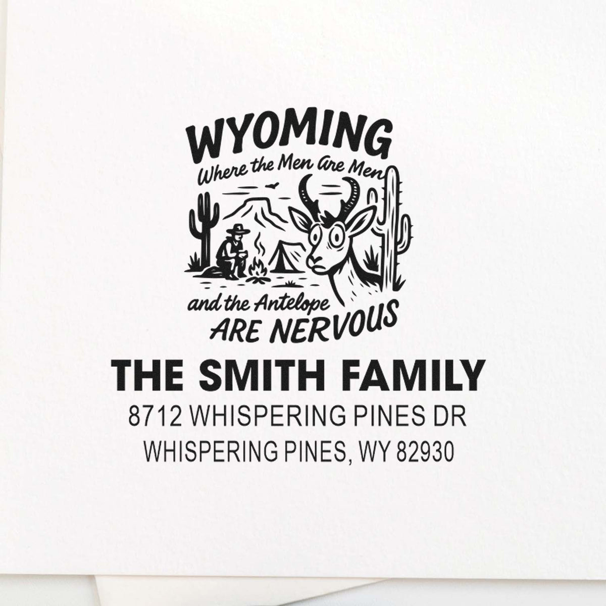 Custom Wyoming address stamp with desert camping scene, antelope, cactus, campfire, and The Smith Family return address in Whispering Pines, WY.