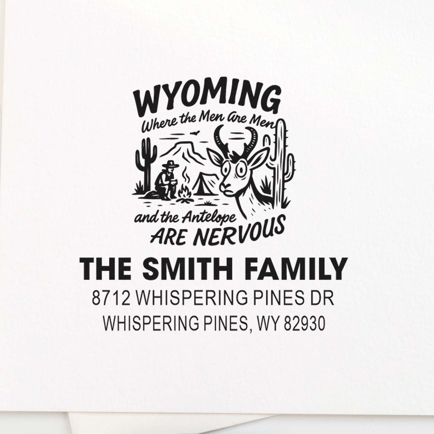Custom Wyoming return address stamp with cowboy, antelope, cacti and campfire western scene for The Smith Family, Whispering Pines, WY 82930