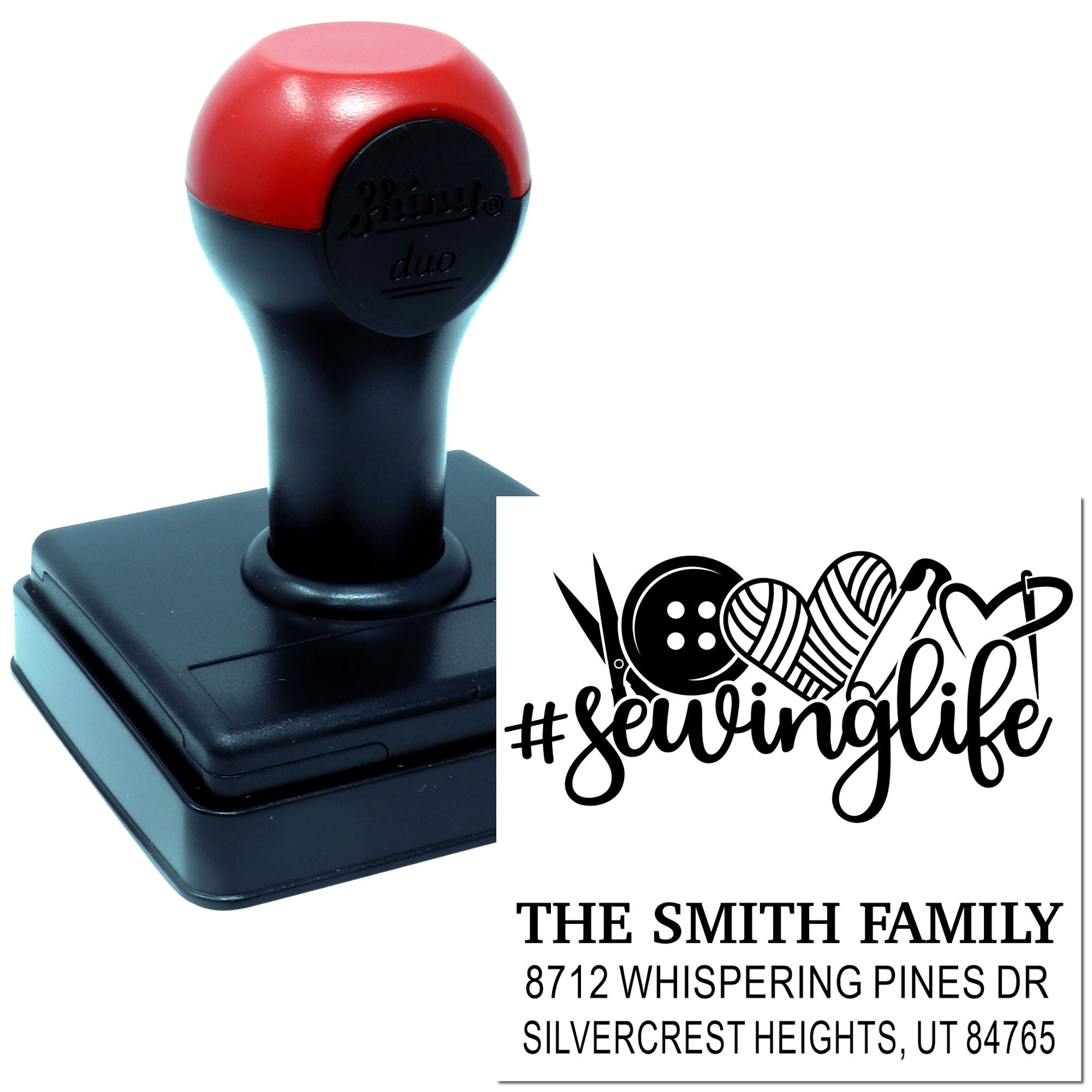 Custom self-inking stamp with #sewinglife sewing design and return address, shown on a red-and-black rubber stamp handle.