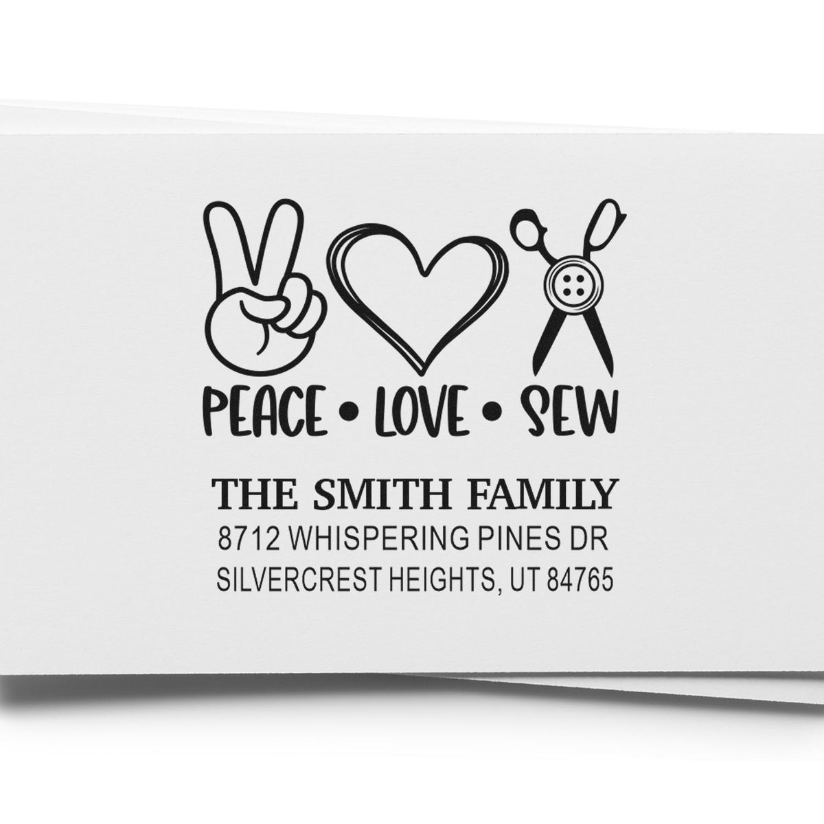 Personalized peace love sew address stamp with peace sign, heart and sewing scissors, featuring The Smith Family and Silvercrest Heights address.