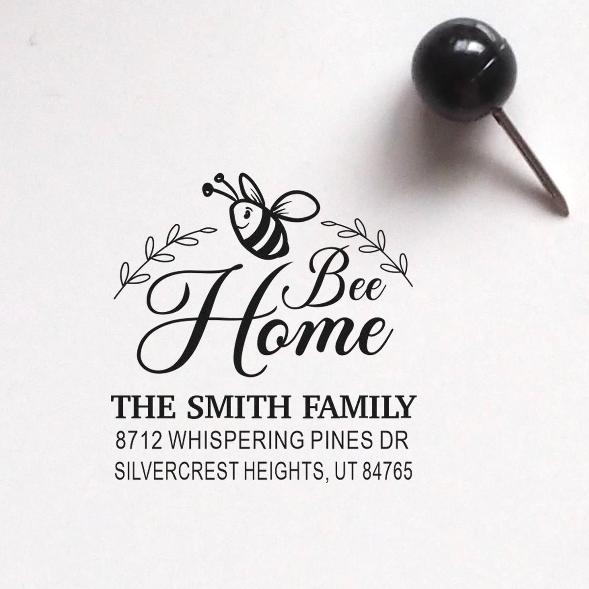 Bee-themed custom address stamp reading Bee Home with Smith Family name and Silvercrest Heights, UT return address on white paper.
