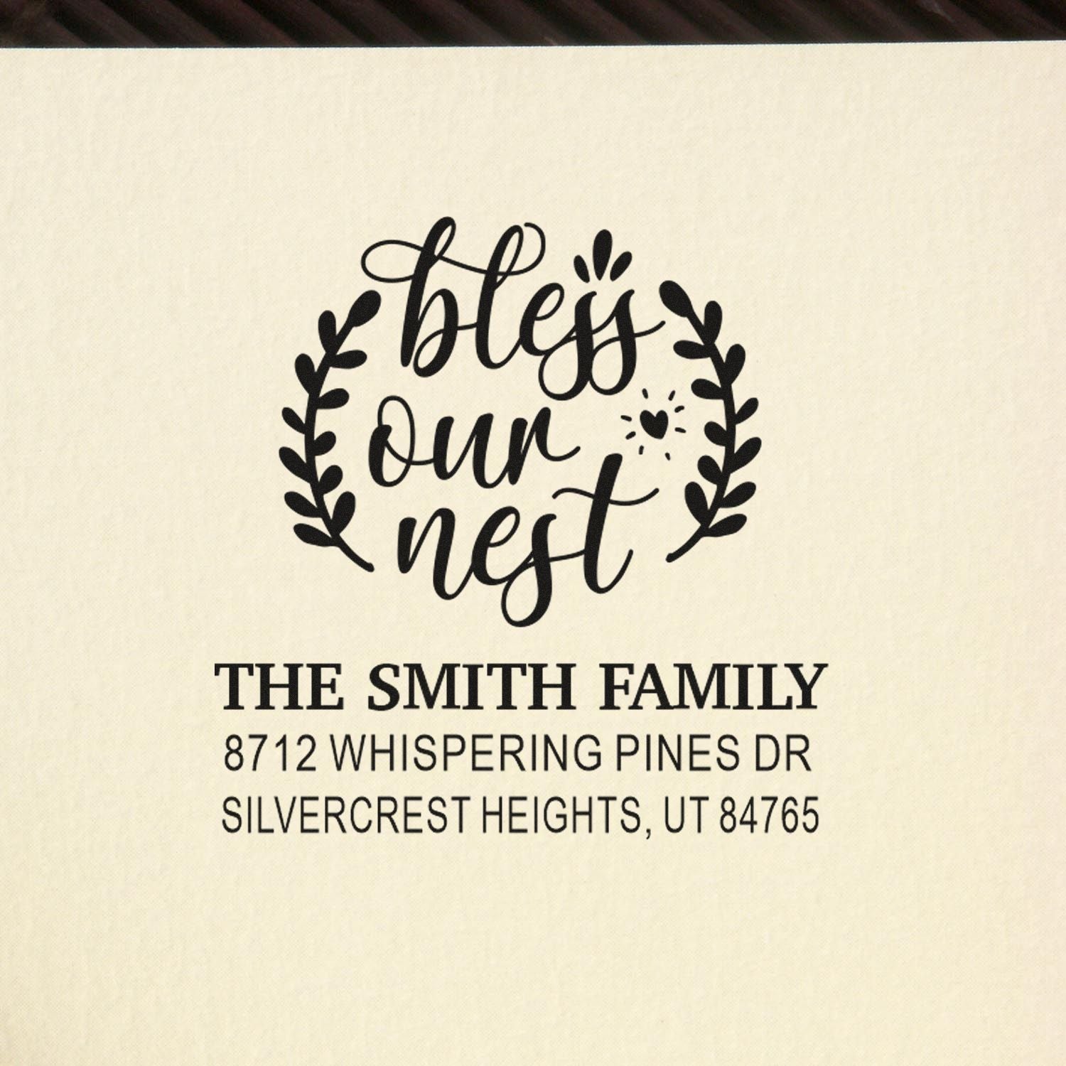 Personalized return address stamp with bless our nest floral wreath and The Smith Family, Silvercrest Heights, UT address.