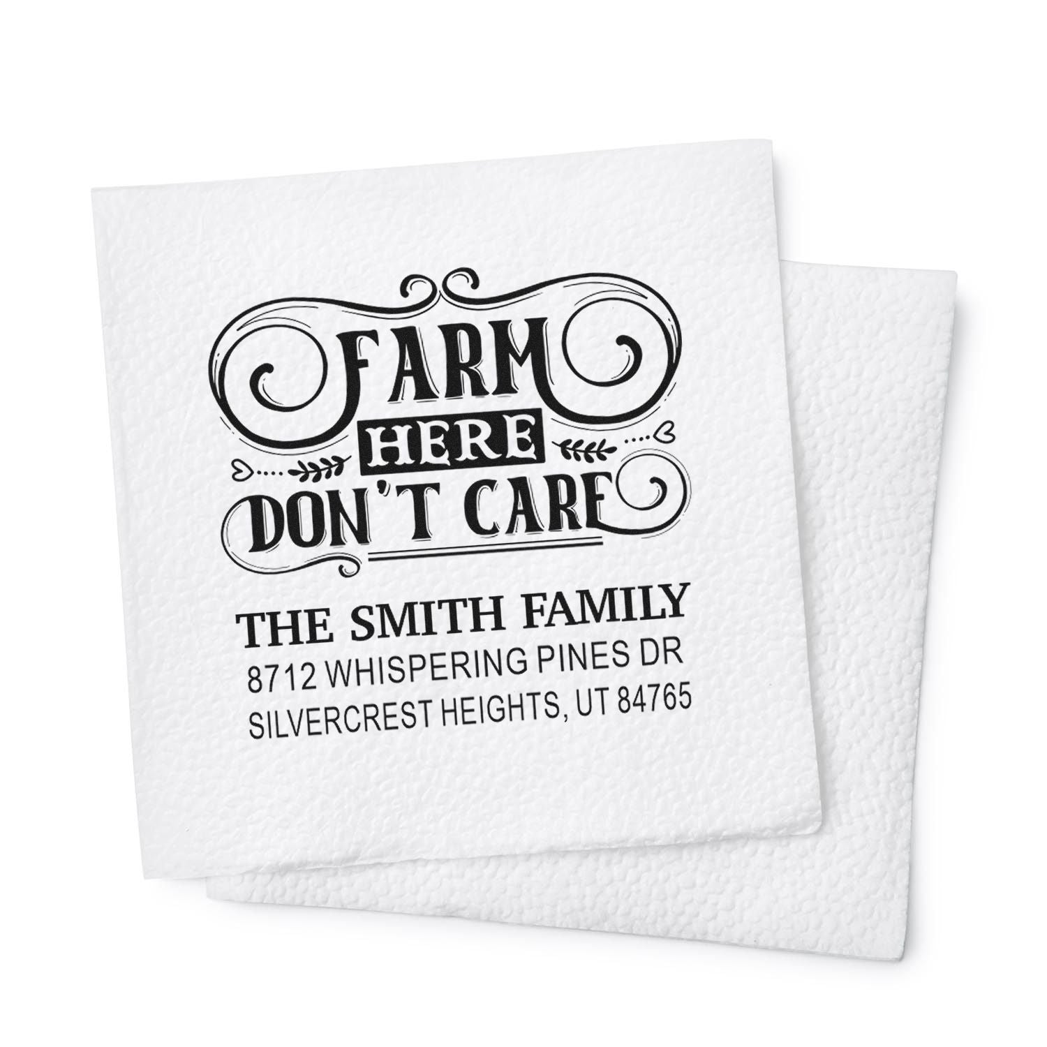 Custom farm return address stamp reading Farm Here Dont Care for The Smith Family on textured white cardstock, shown on stacked paper.