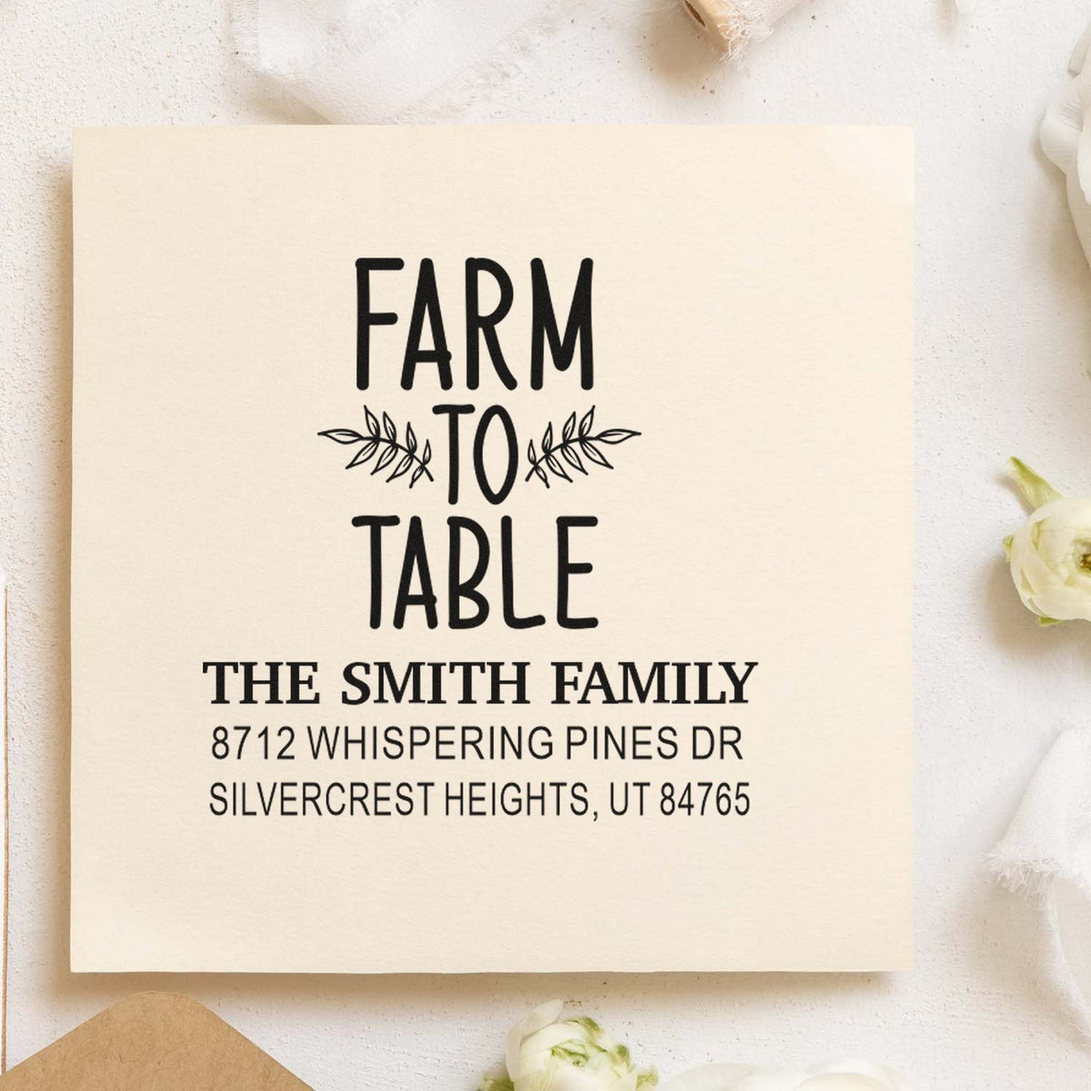 Custom Farm to Table address stamp for The Smith Family, printed on cream paper with leafy accents and white flowers.