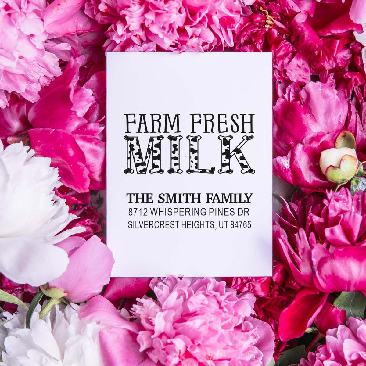 Custom Farm Fresh Milk address stamp with The Smith Family name and address, shown on a pink peony floral background.