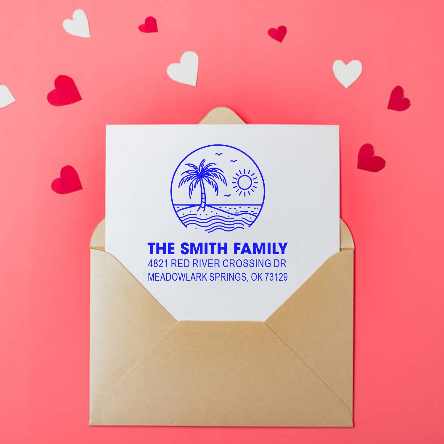 Custom family address stamp on a tan envelope, featuring a tropical palm logo, against a pink background with scattered heart accents.
