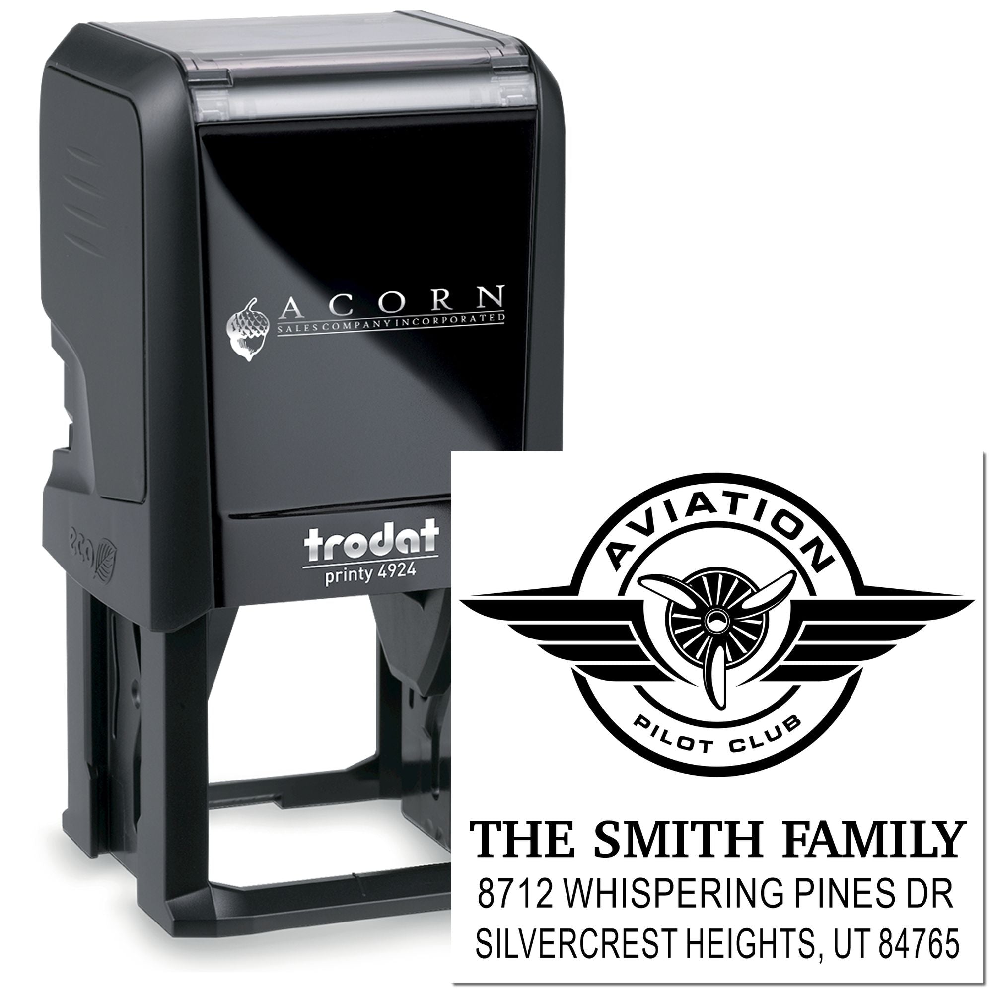 Custom black self-inking Trodat stamp with Aviation Pilot Club logo and The Smith Family address imprint on a white background.