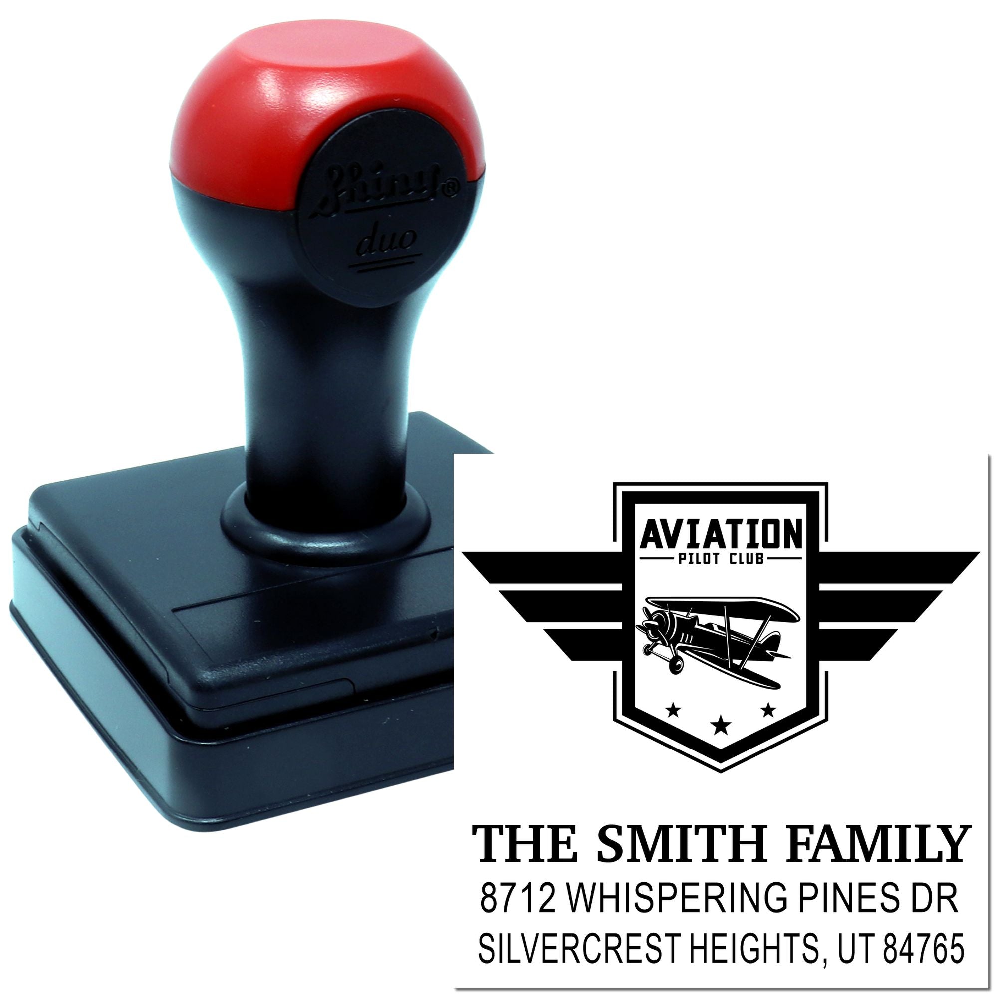 Custom self-inking address stamp with Aviation Pilot Club biplane logo, showing The Smith Family name and Utah address on a white background.