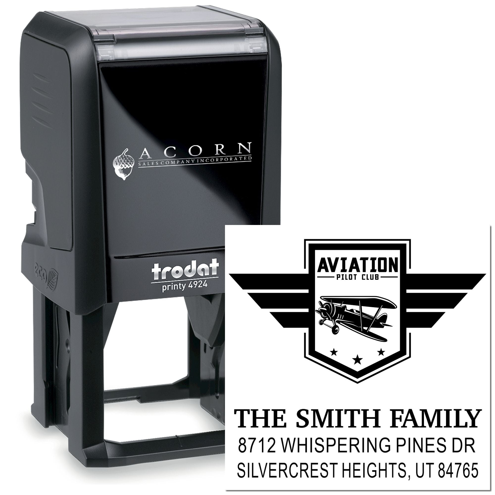 Custom self-inking Trodat stamp with Aviation Pilot Club logo, The Smith Family name, and Utah address on a white product display.