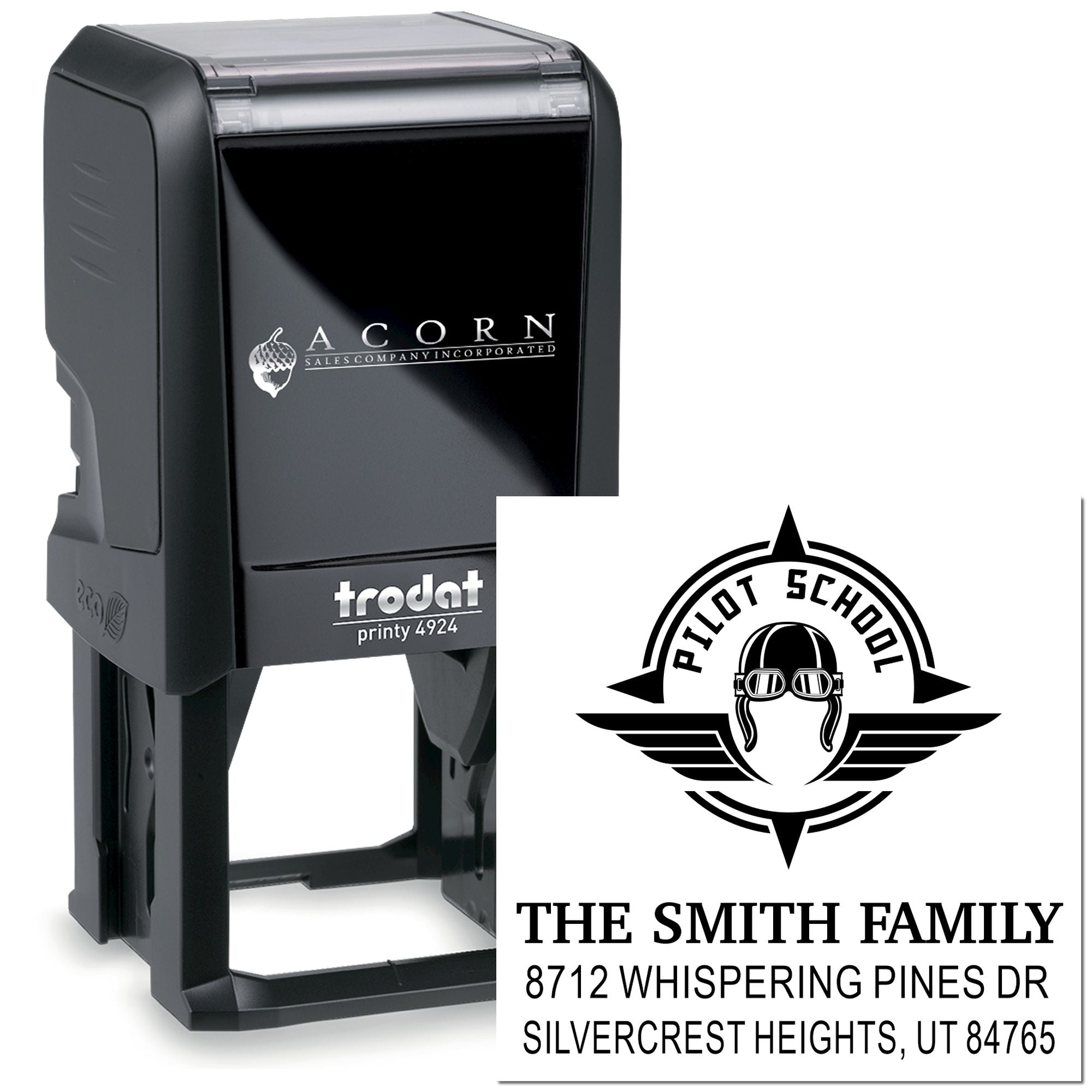 Custom self-inking stamp with Pilot School logo and The Smith Family address, shown on a black Trodat Printy 4924 stamp against a white background.
