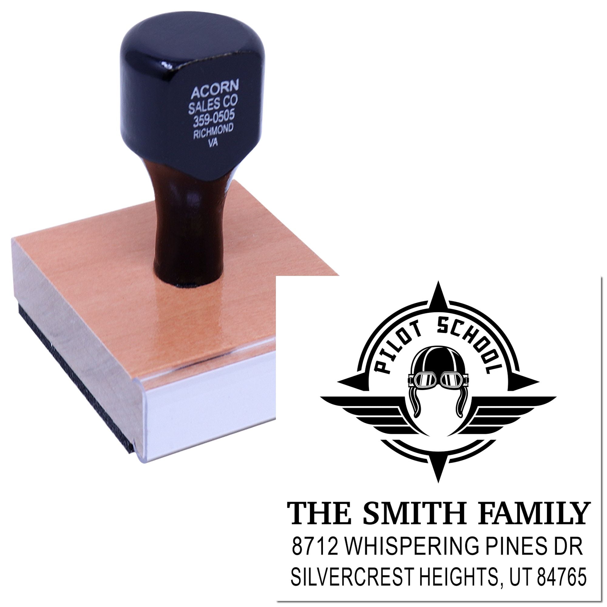 Custom self-inking rubber stamp on a block, featuring Pilot School logo and The Smith Family address design for personalized mail and crafts.