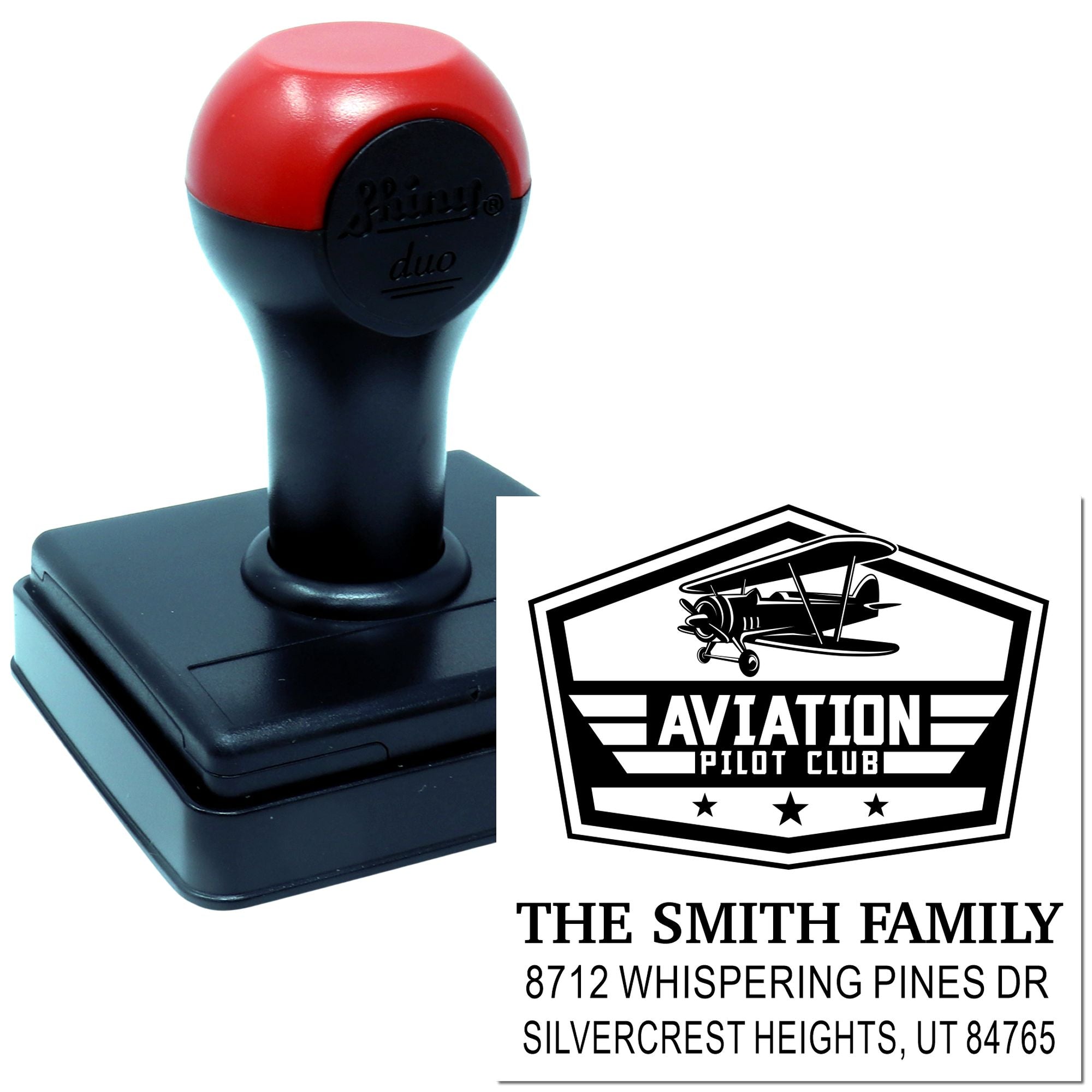 Custom self-inking aviation pilot club address stamp with airplane logo and The Smith Family return address design on a white background.