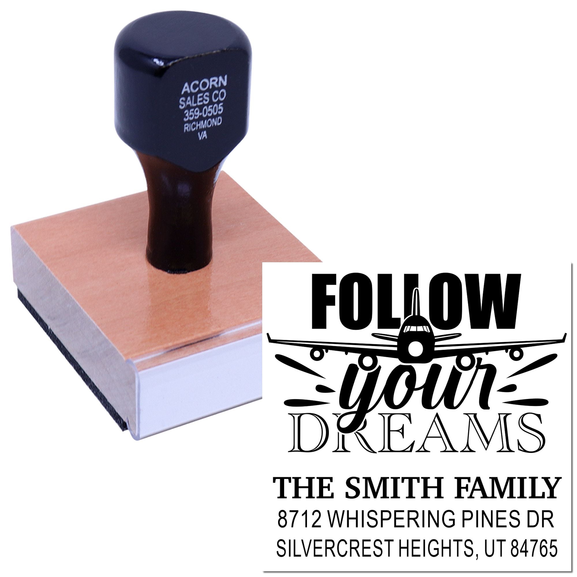 Custom rubber address stamp with airplane Follow Your Dreams design and The Smith Family return address, shown stamping on a block.