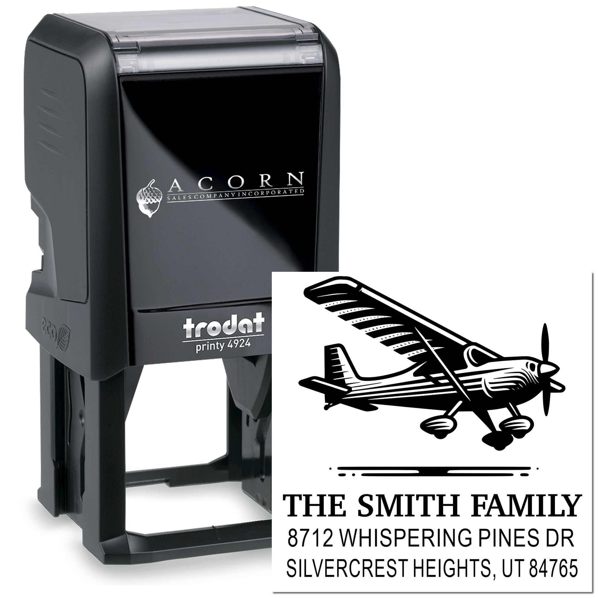 Personalized self-inking Trodat Printy address stamp with airplane logo, shown beside sample imprint on white background.