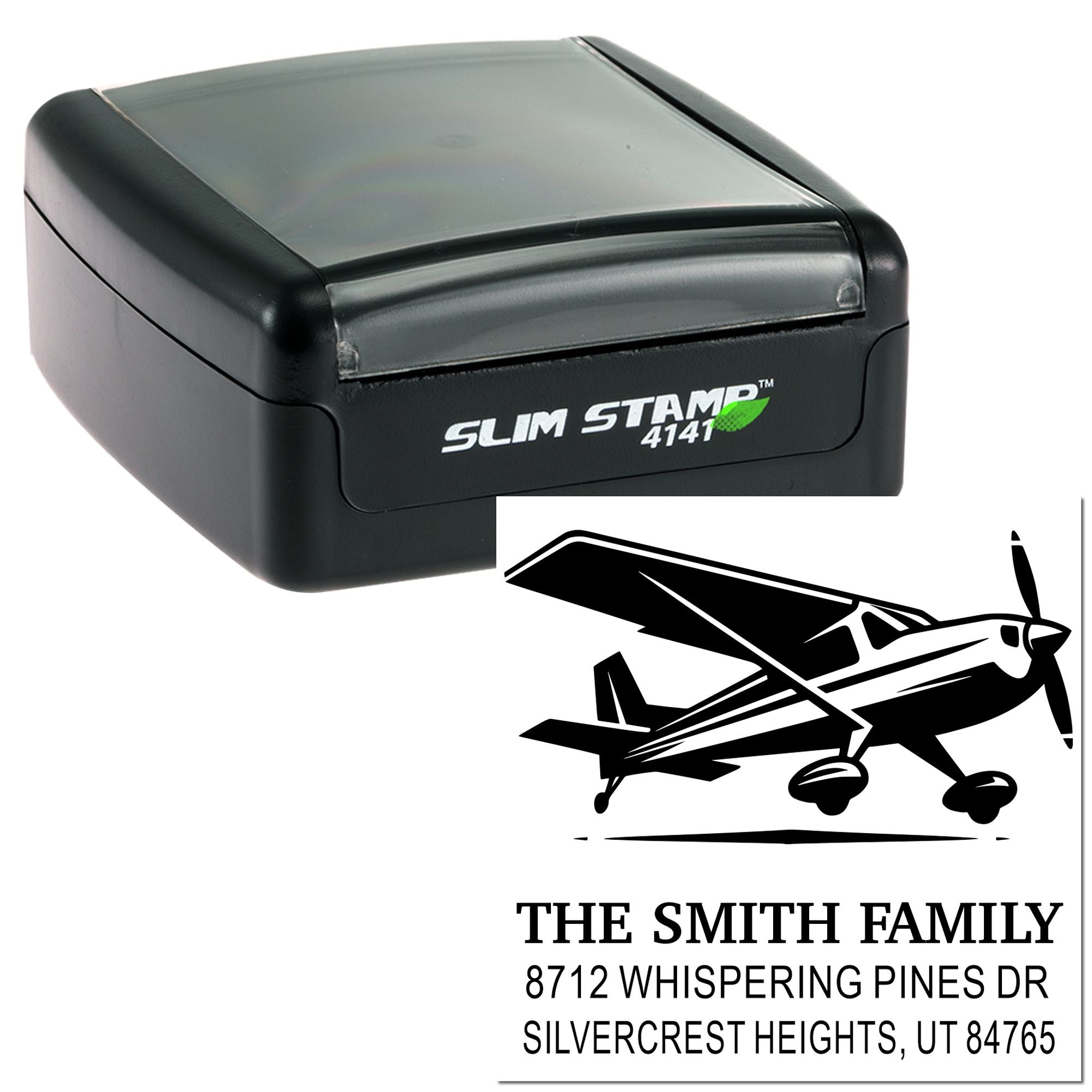 Slim Stamp 4141 custom self-inking address stamp with airplane logo and The Smith Family mailing address on a black stamp case.