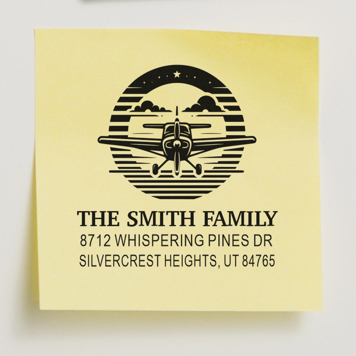 Custom self-inking family address stamp with airplane logo, The Smith Family, 8712 Whispering Pines Dr, Silvercrest Heights, UT 84765