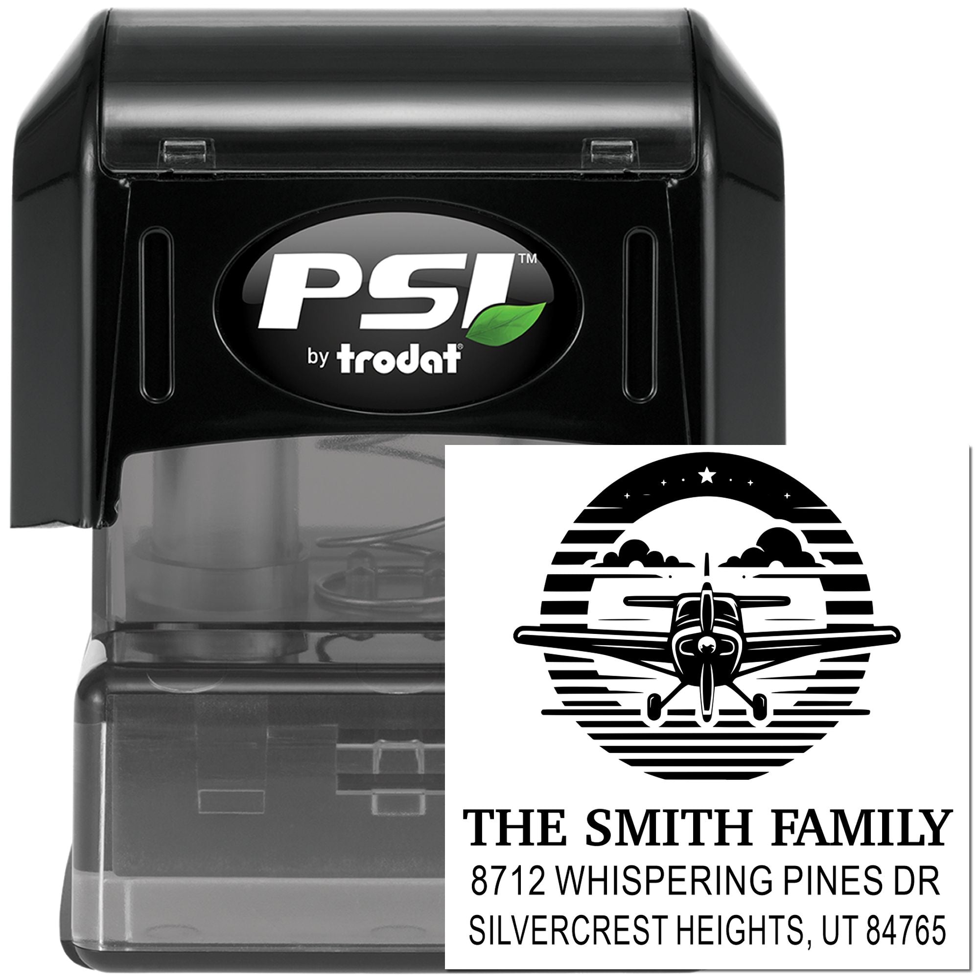 PSI by Trodat self-inking custom address stamp with airplane family logo imprint and return address, shown in black on white background.