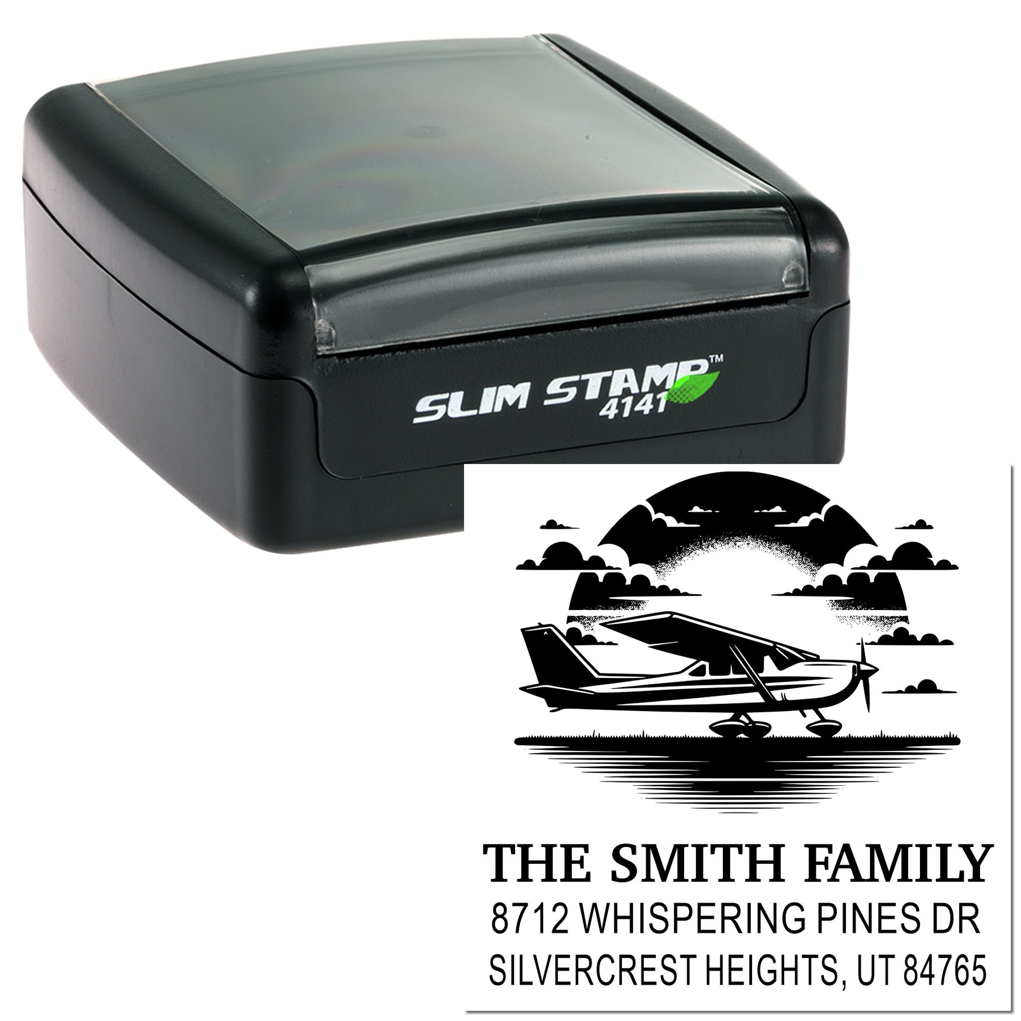 Black Slim Stamp self-inking address stamp with airplane artwork for The Smith Family, featuring a small plane, clouds, and return address.