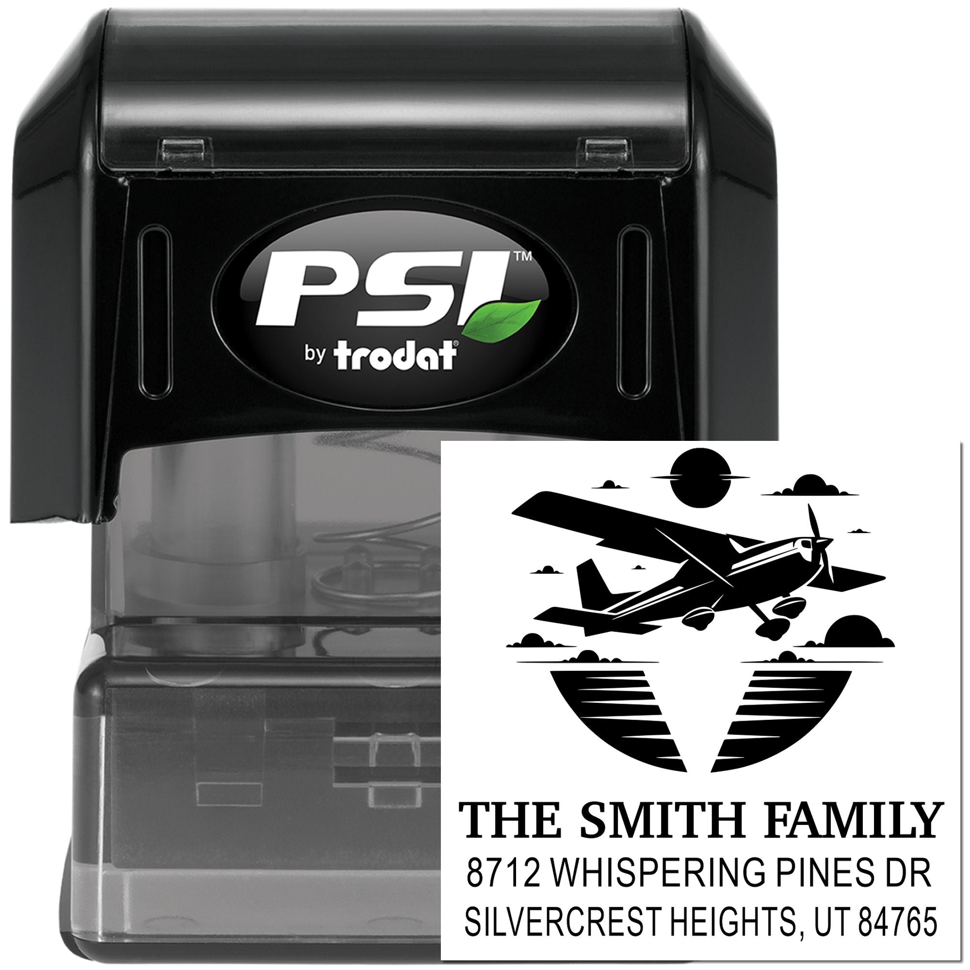 PSI by Trodat self-inking custom address stamp with airplane silhouette, Smith Family name, and Silvercrest Heights, UT address on black case.