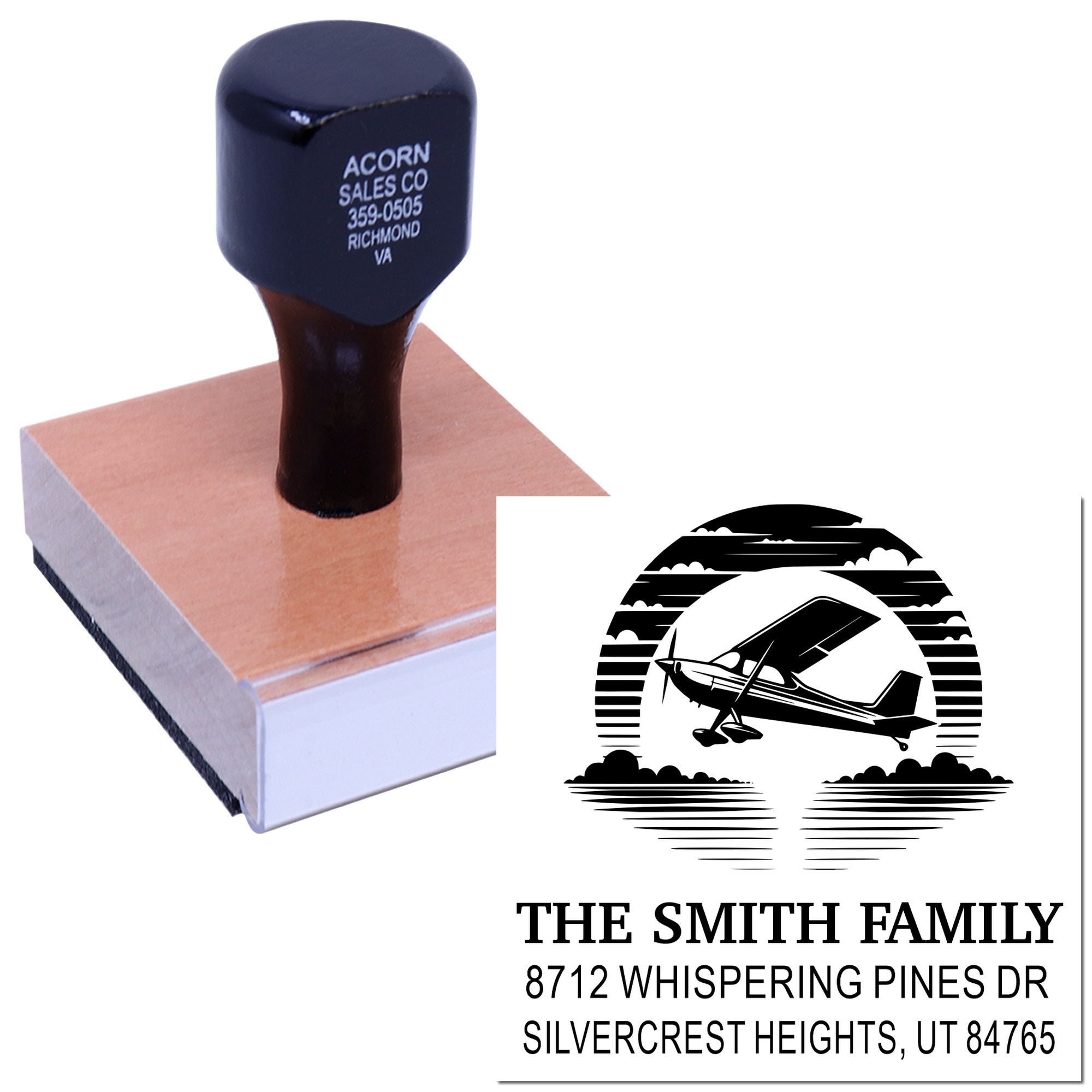 Custom self-inking address stamp with airplane design, showing The Smith Family name and Silvercrest Heights, UT return address on white background.