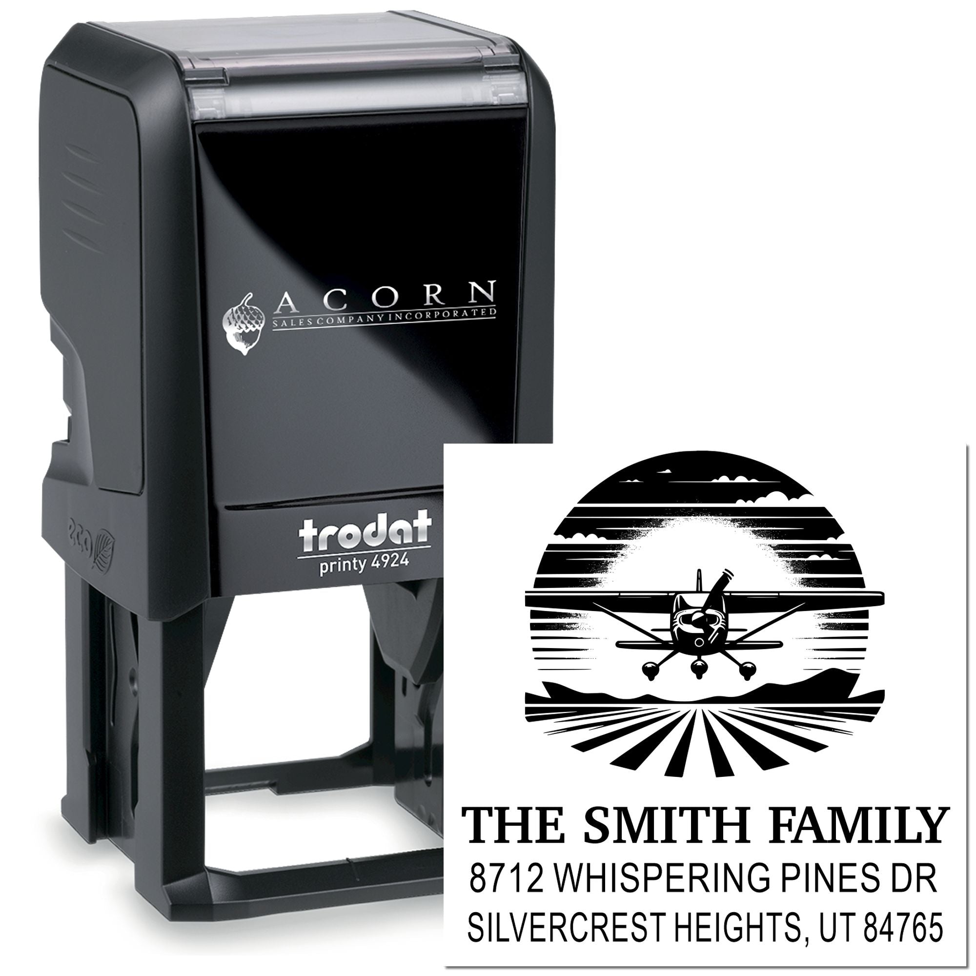 Custom self-inking address stamp by Trodat with Smith Family return address and airplane sunset design on white background