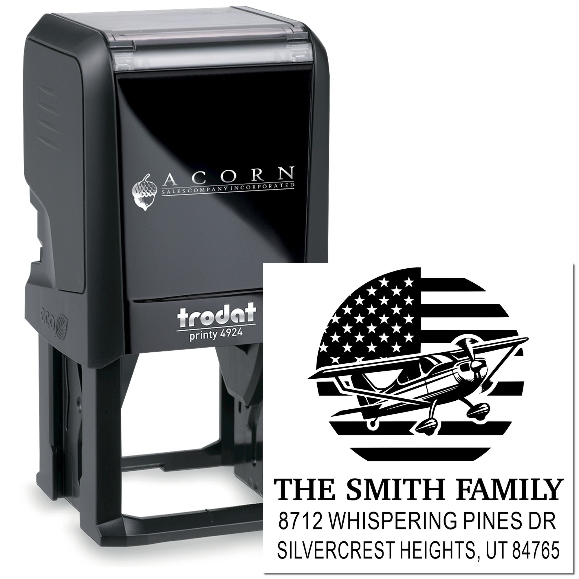 Custom self-inking Trodat stamp with airplane and American flag design for The Smith Family address on white background.