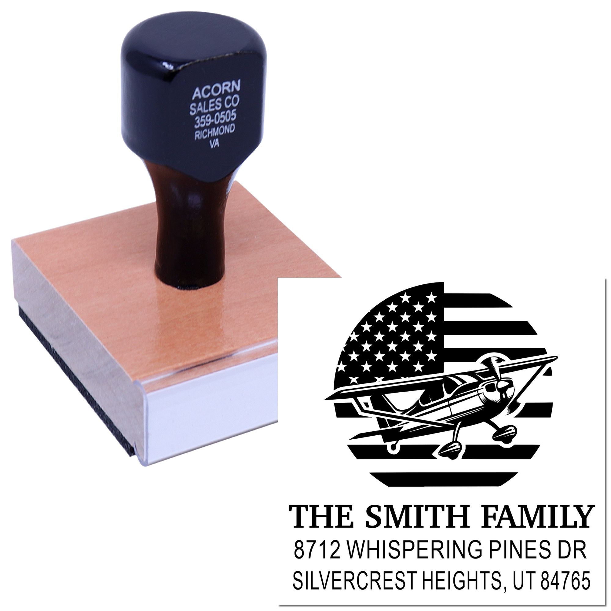 Custom address rubber stamp with airplane logo on a wooden block, showing The Smith Family and Utah address imprint.