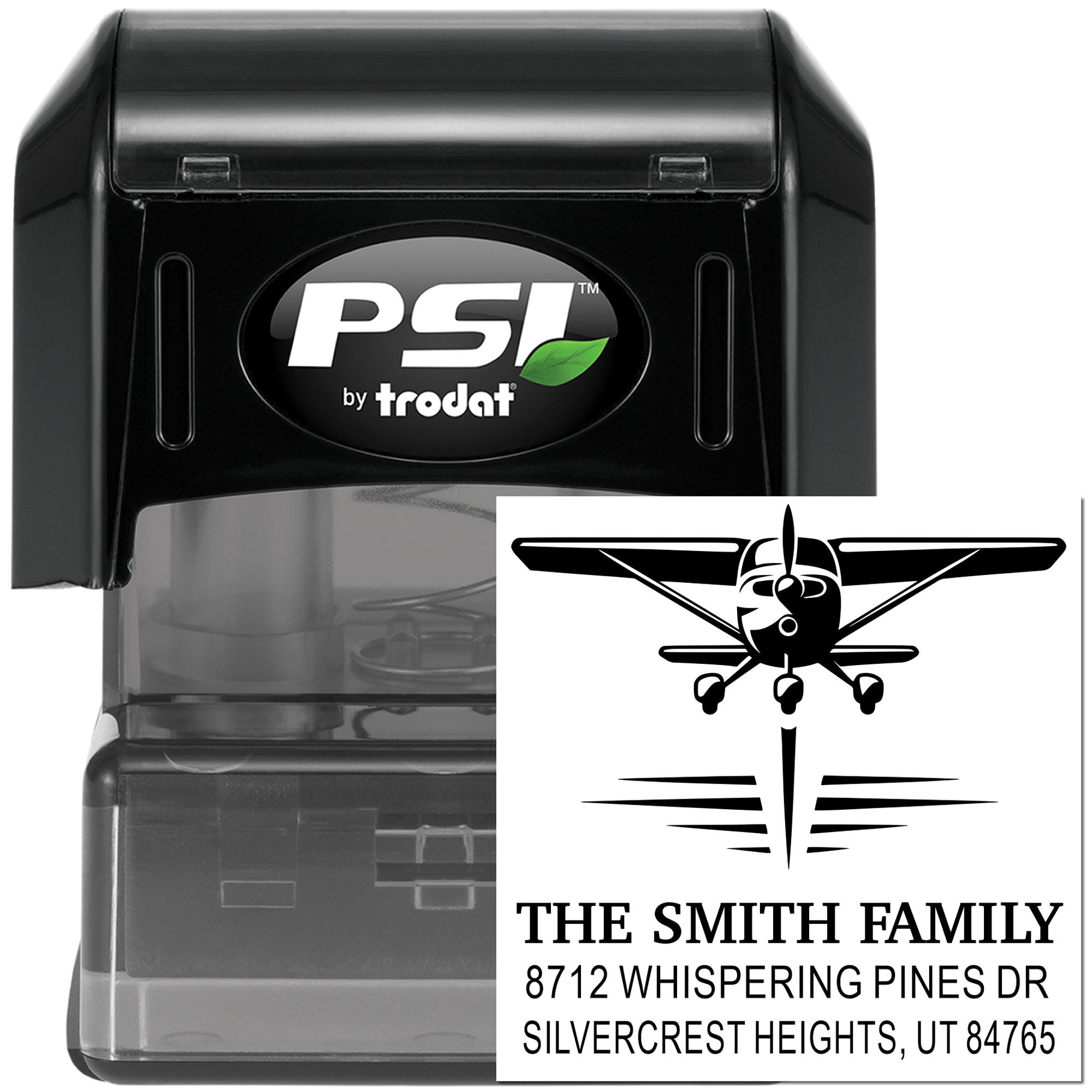 PSI by Trodat self-inking address stamp with airplane logo and custom Smith family address imprint on white card.