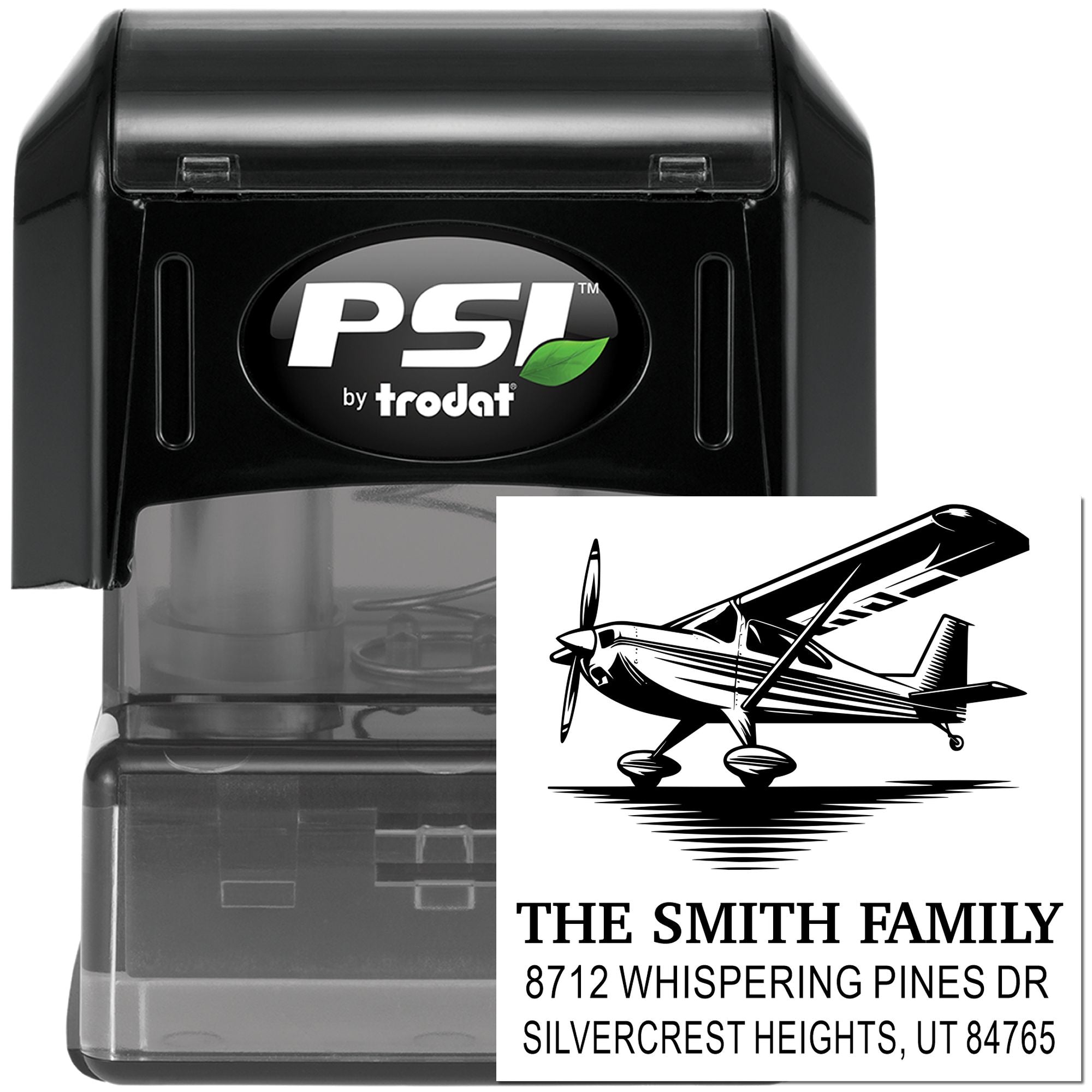 Custom self-inking address stamp with airplane graphic, featuring The Smith Family and Silvercrest Heights address in a PSI by Trodat case.