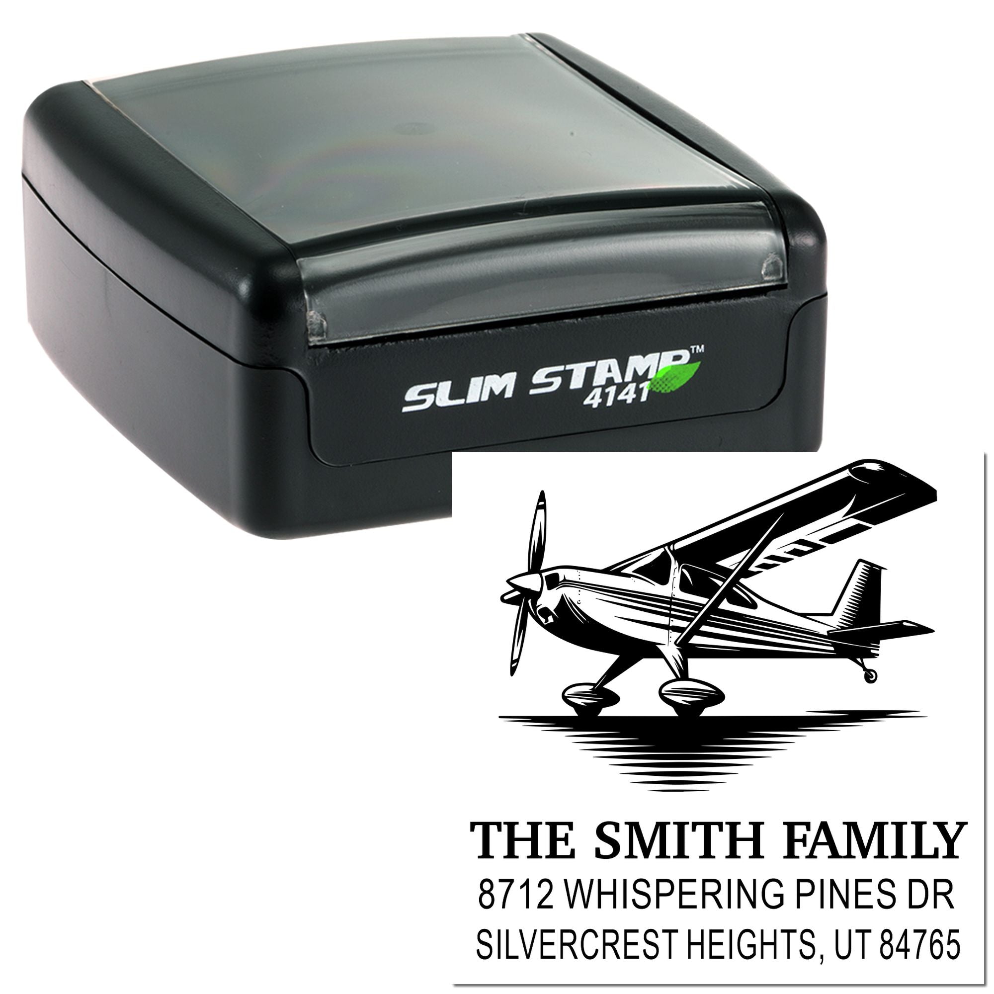 Slim Stamp 4141 self-inking address stamp with airplane graphic and The Smith Family address, displayed on a clean white background.