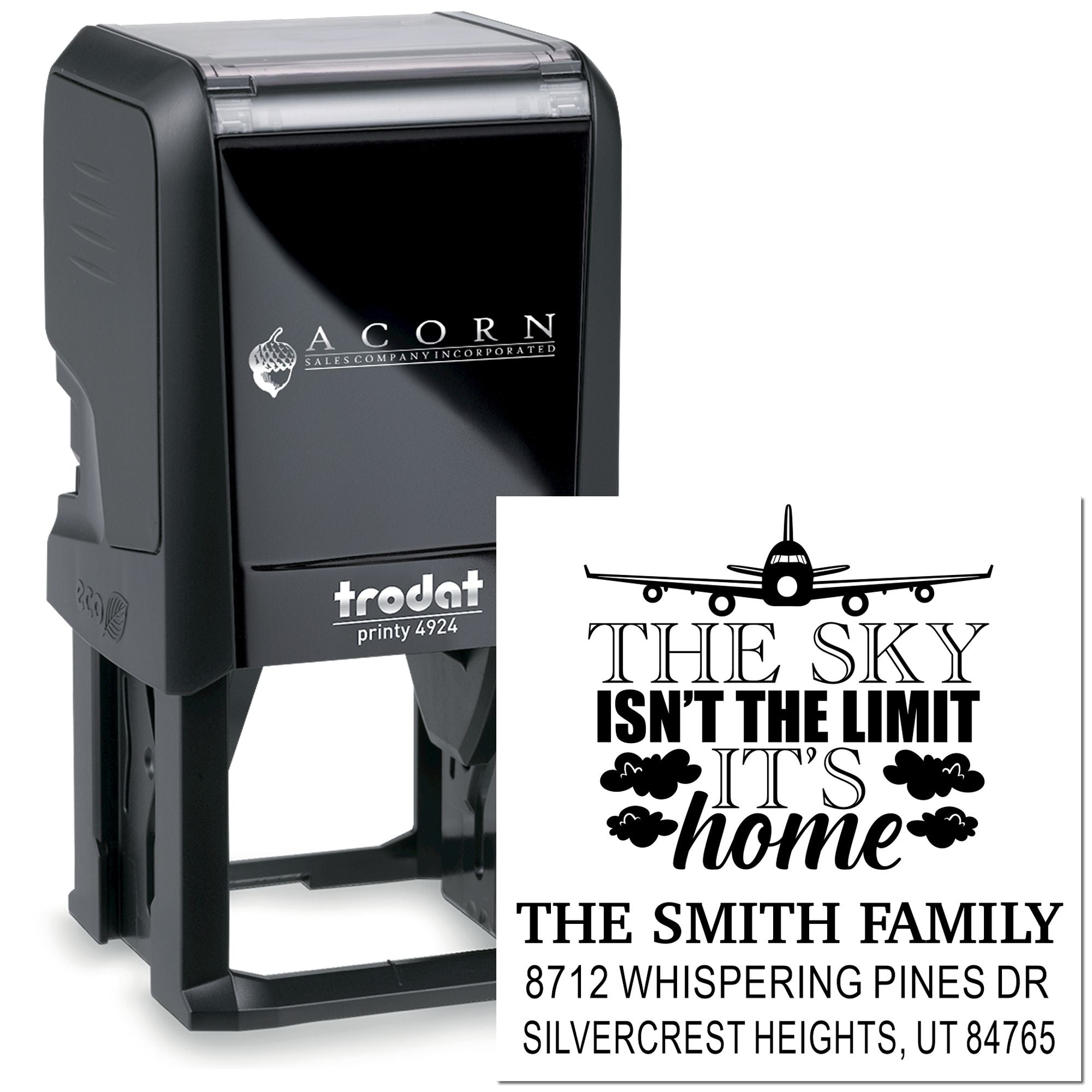 Custom self-inking stamp with airplane design, The sky isnt the limit, its home text, and The Smith Family address on white background.