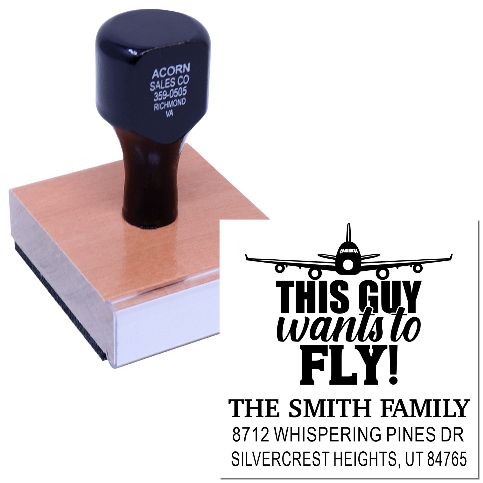 Personalized custom rubber address stamp with airplane graphic and This Guy Wants to Fly! text on a wooden stamp block.