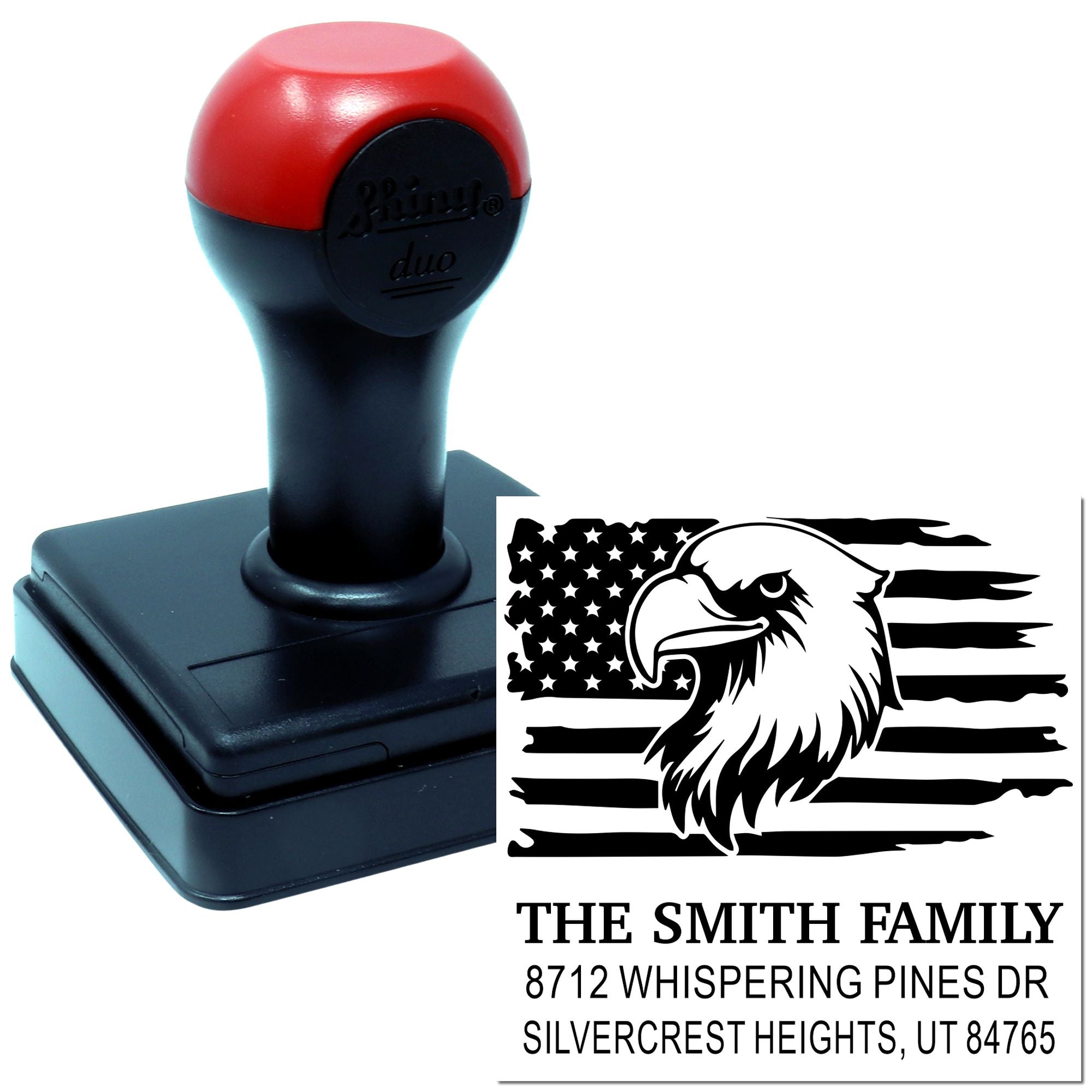 Custom self-inking address stamp with red and black handle, showing an eagle and American flag design sample with The Smith Family address on white background.