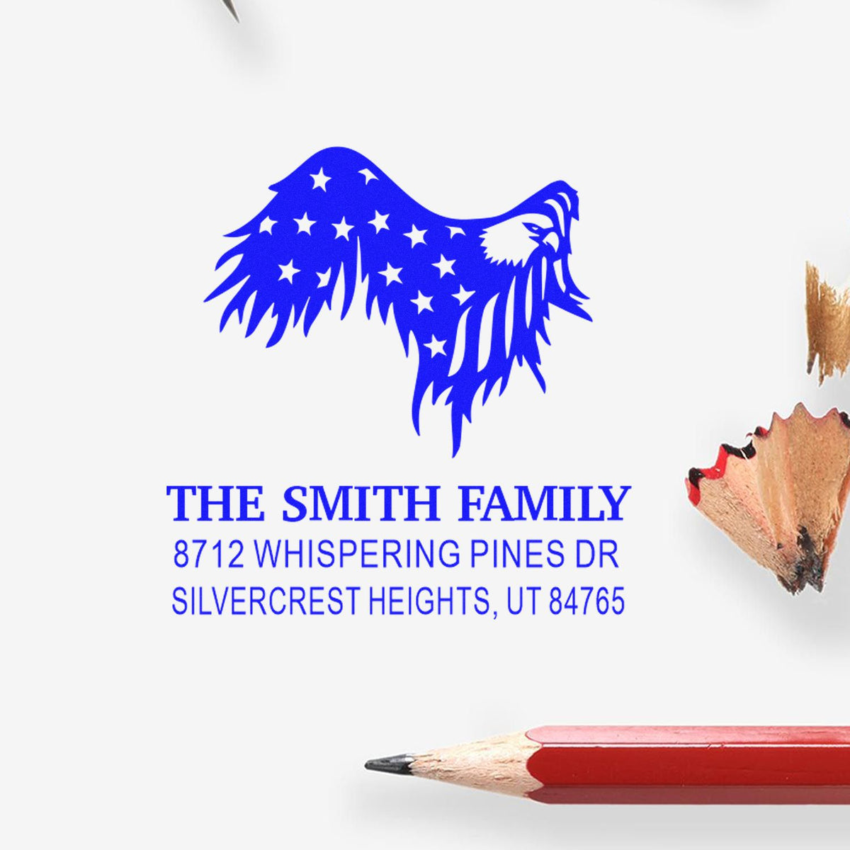 Custom rubber return address stamp with patriotic eagle design, The Smith Family name, and Silvercrest Heights, UT address in blue ink.