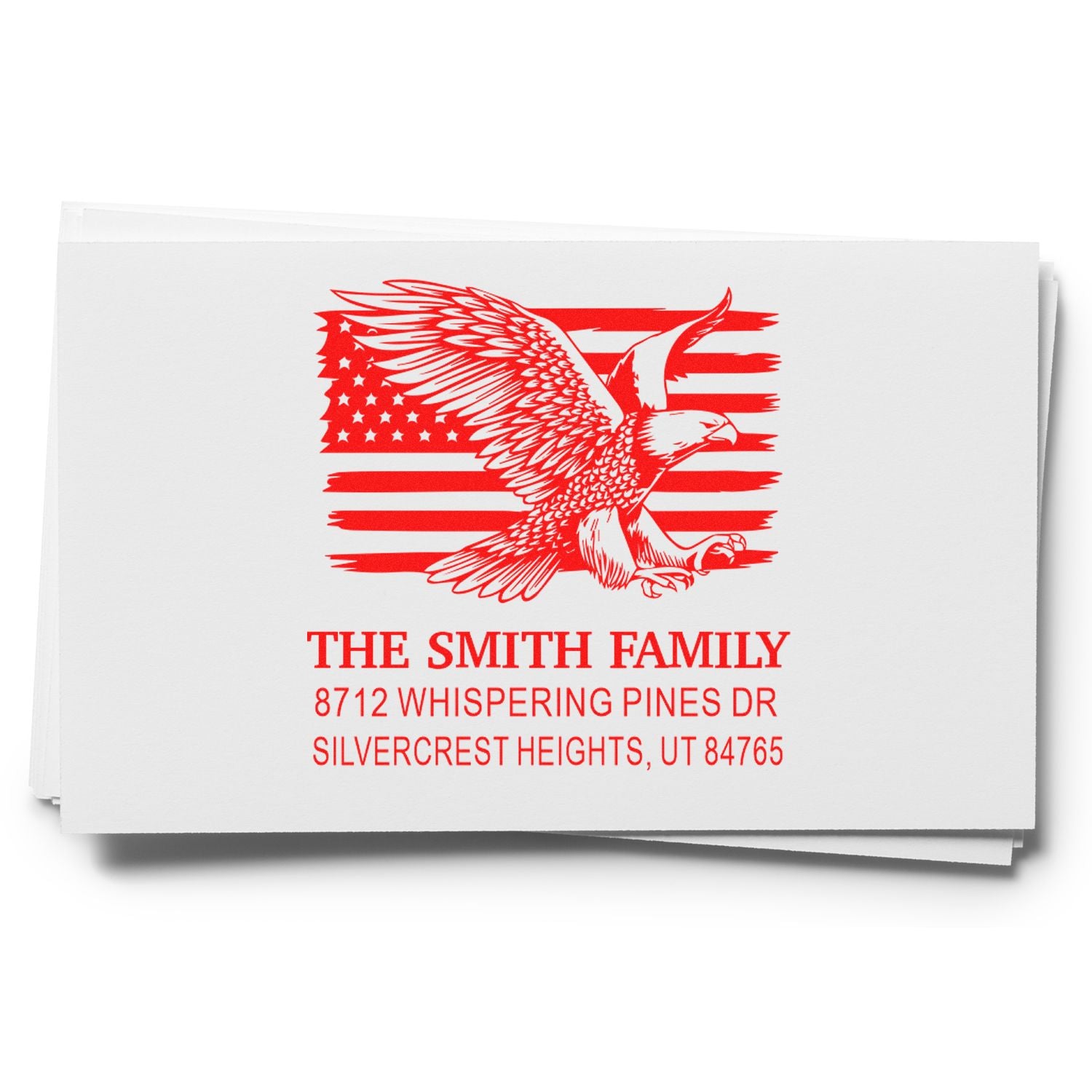 Custom self-inking return address stamp with eagle over American flag, red ink design, and The Smith Family name and Silvercrest Heights, UT address.